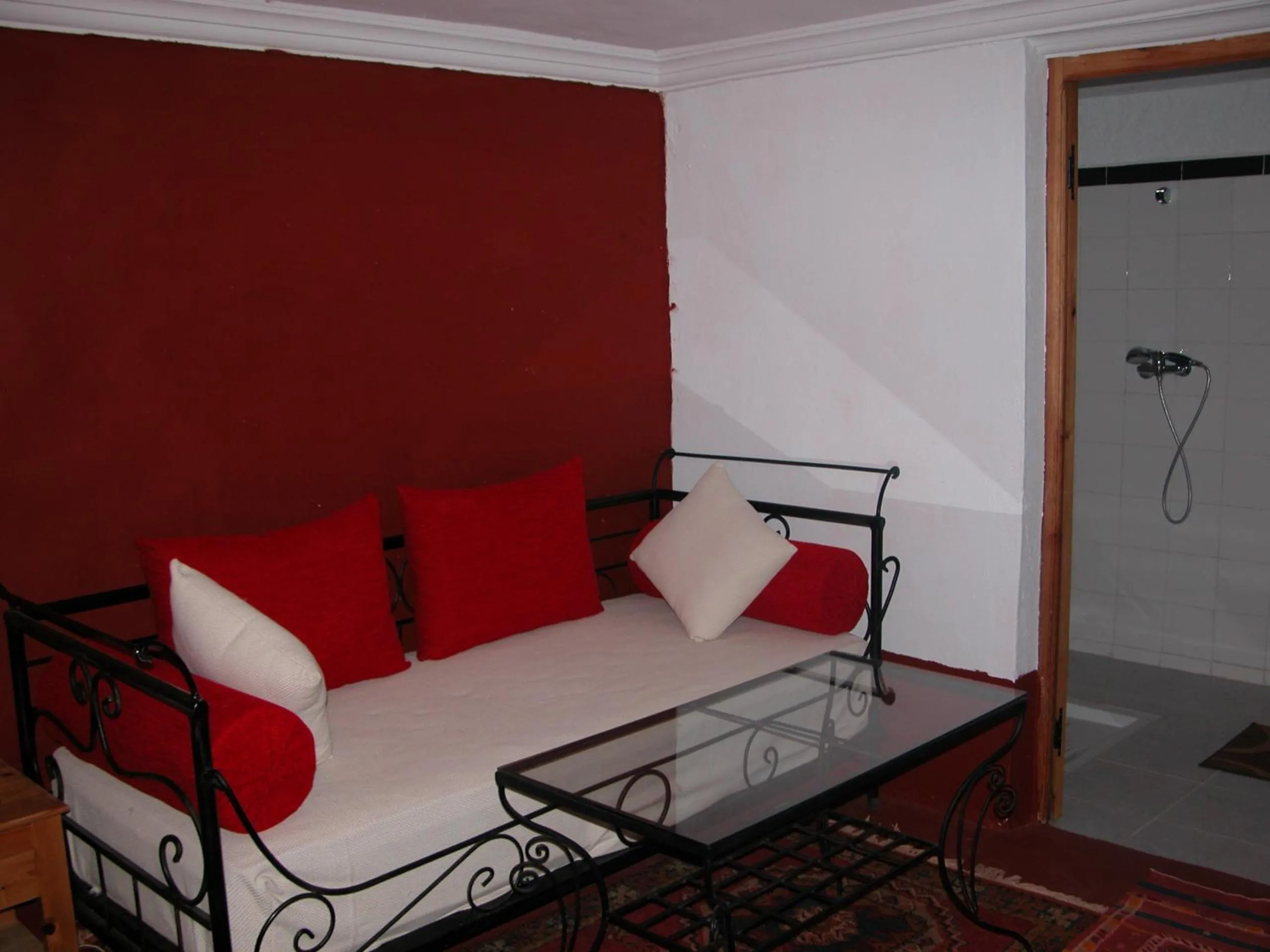 Seating area, Bed in Kasbah Petit Nomade