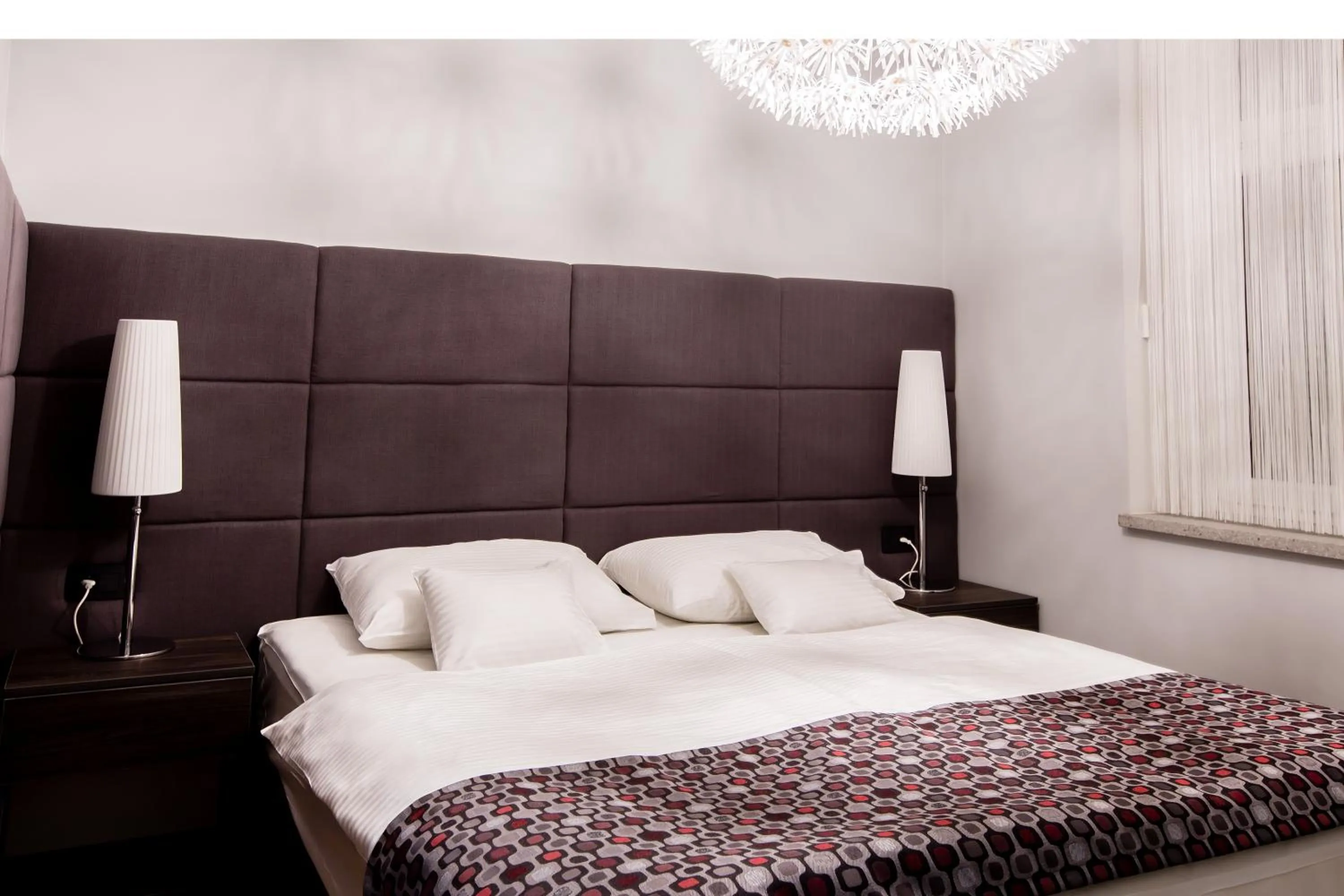 Bed in WH Apartments