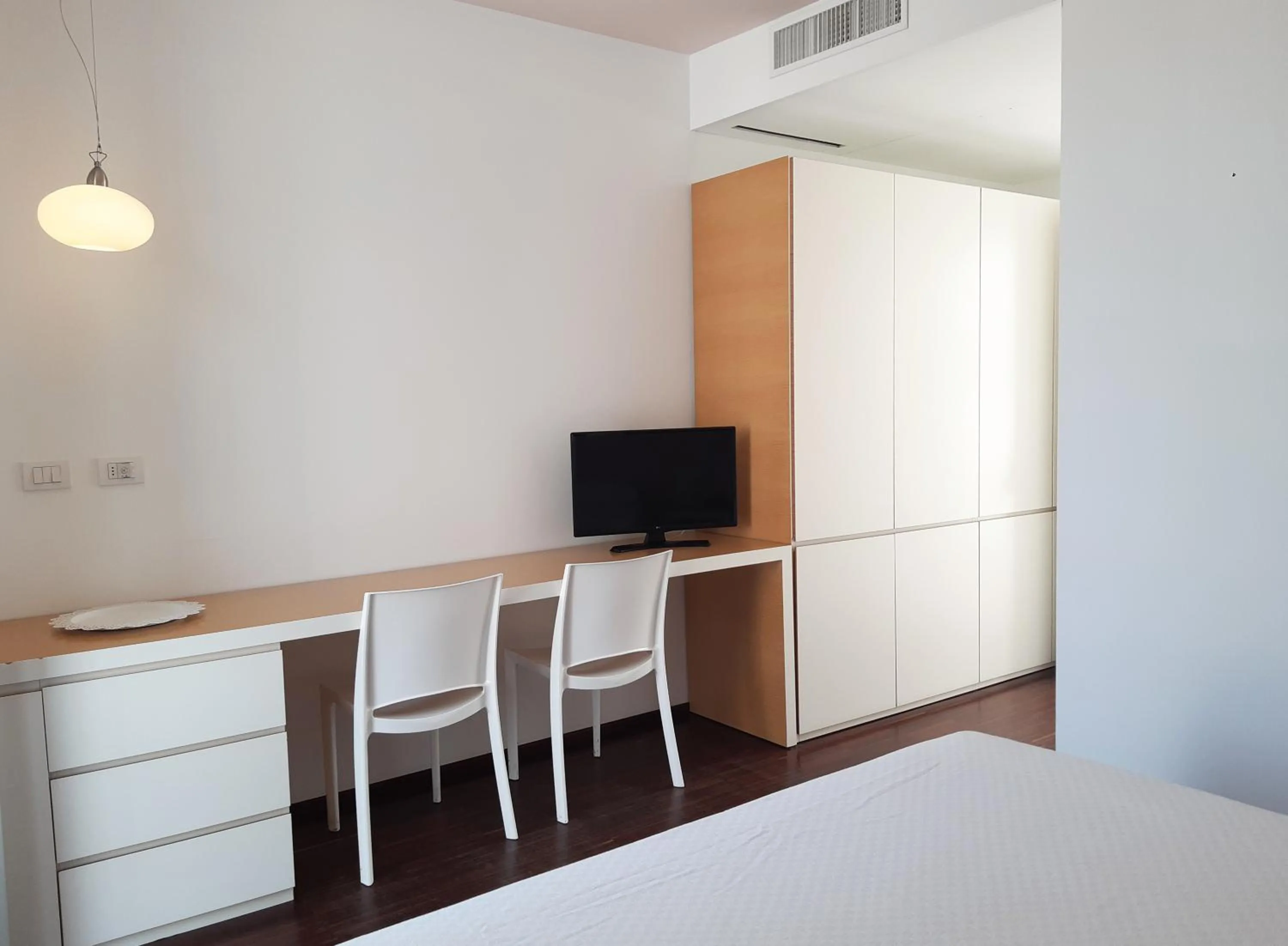 Bedroom in Hotel Grecale