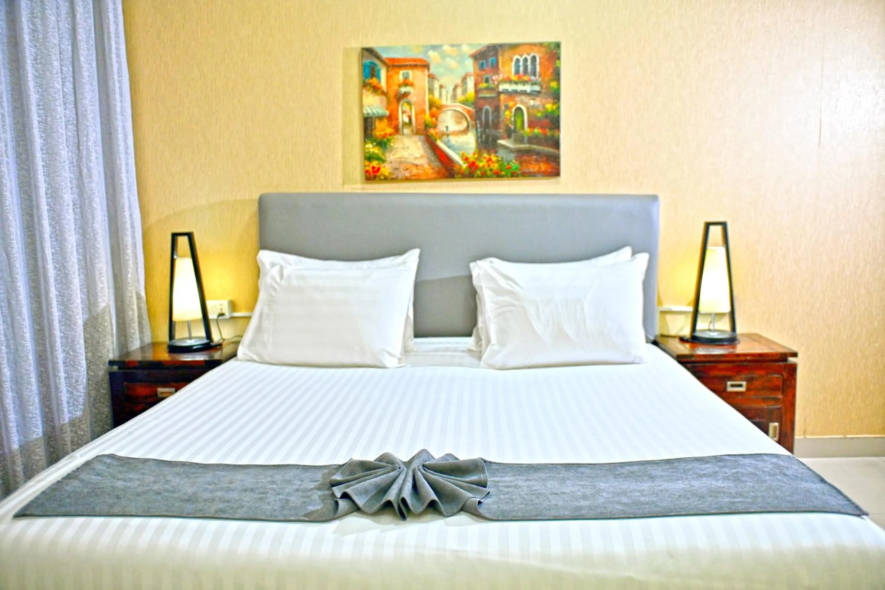 Bed in Ewan Tower Hotel Apartments