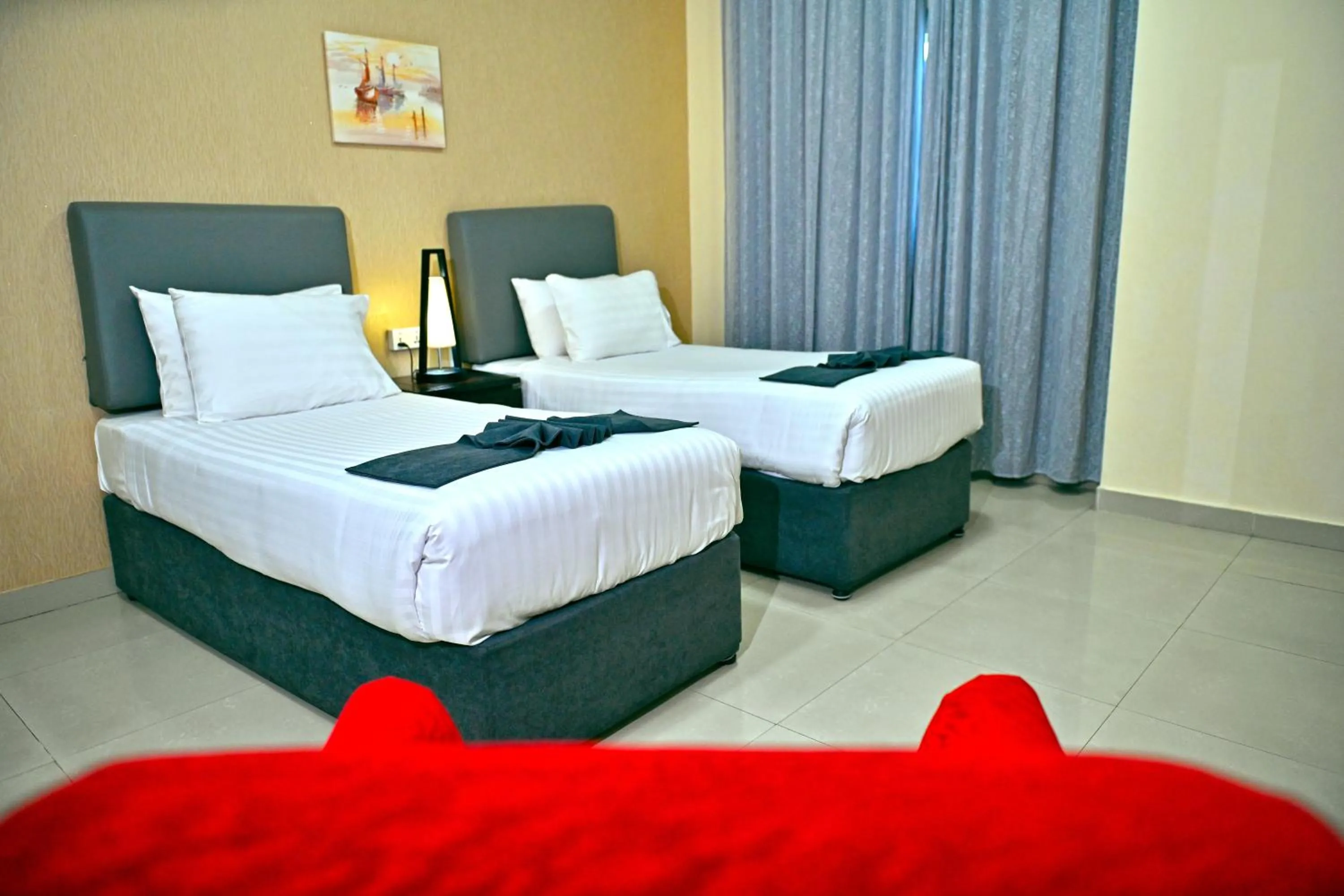 Bed in Ewan Tower Hotel Apartments