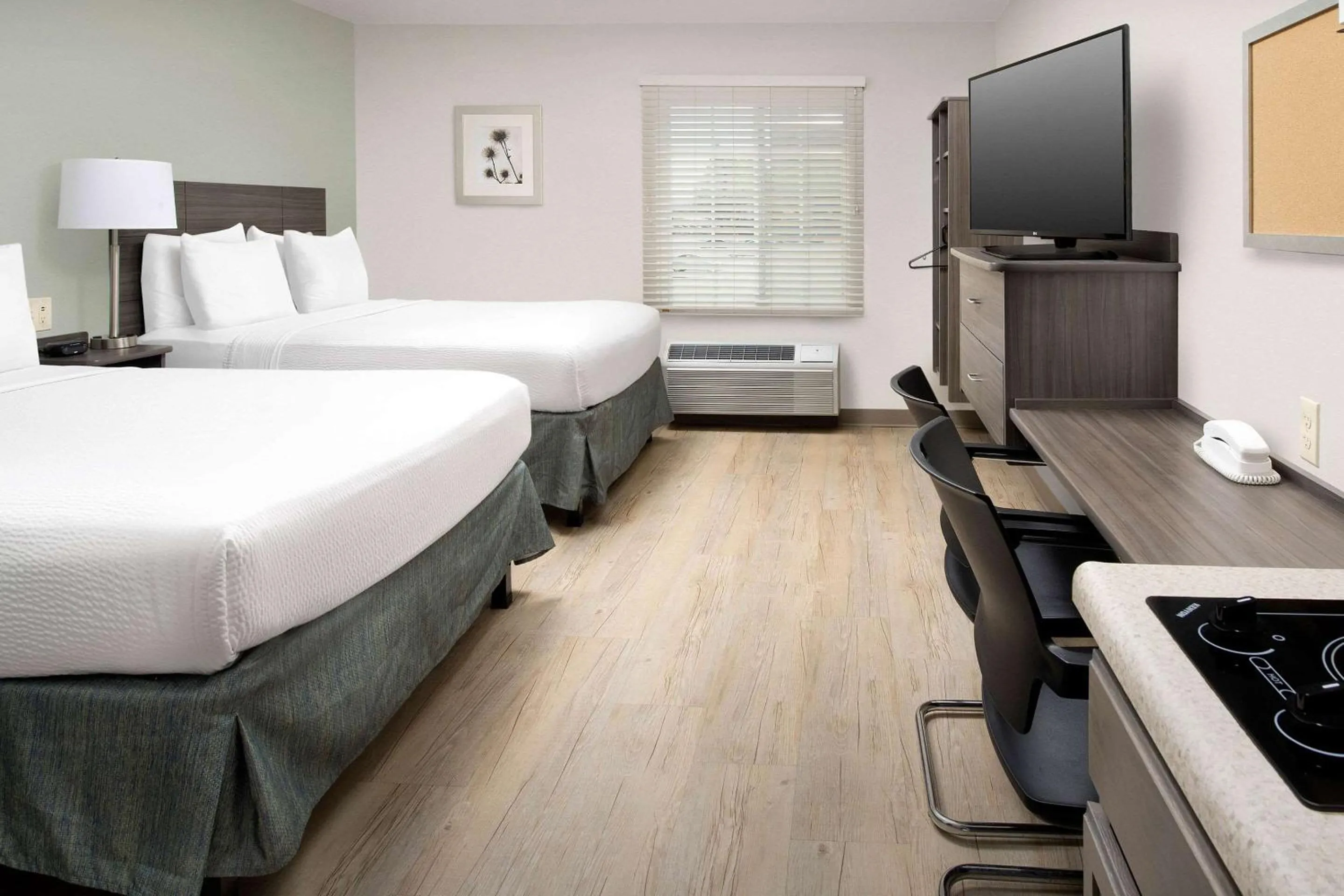Bedroom, Bed in WoodSpring Suites Broken Arrow