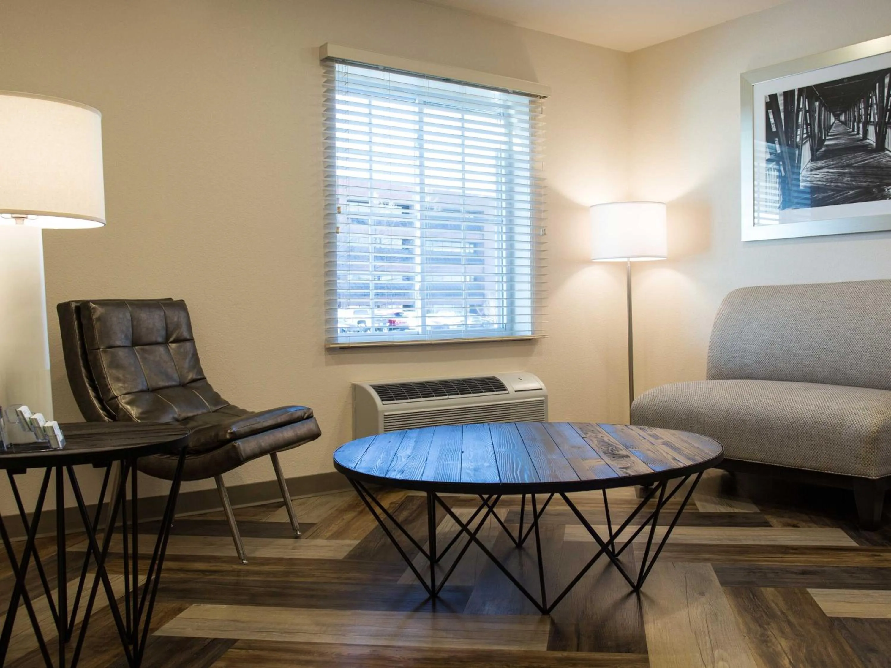 Seating area in WoodSpring Suites Broken Arrow