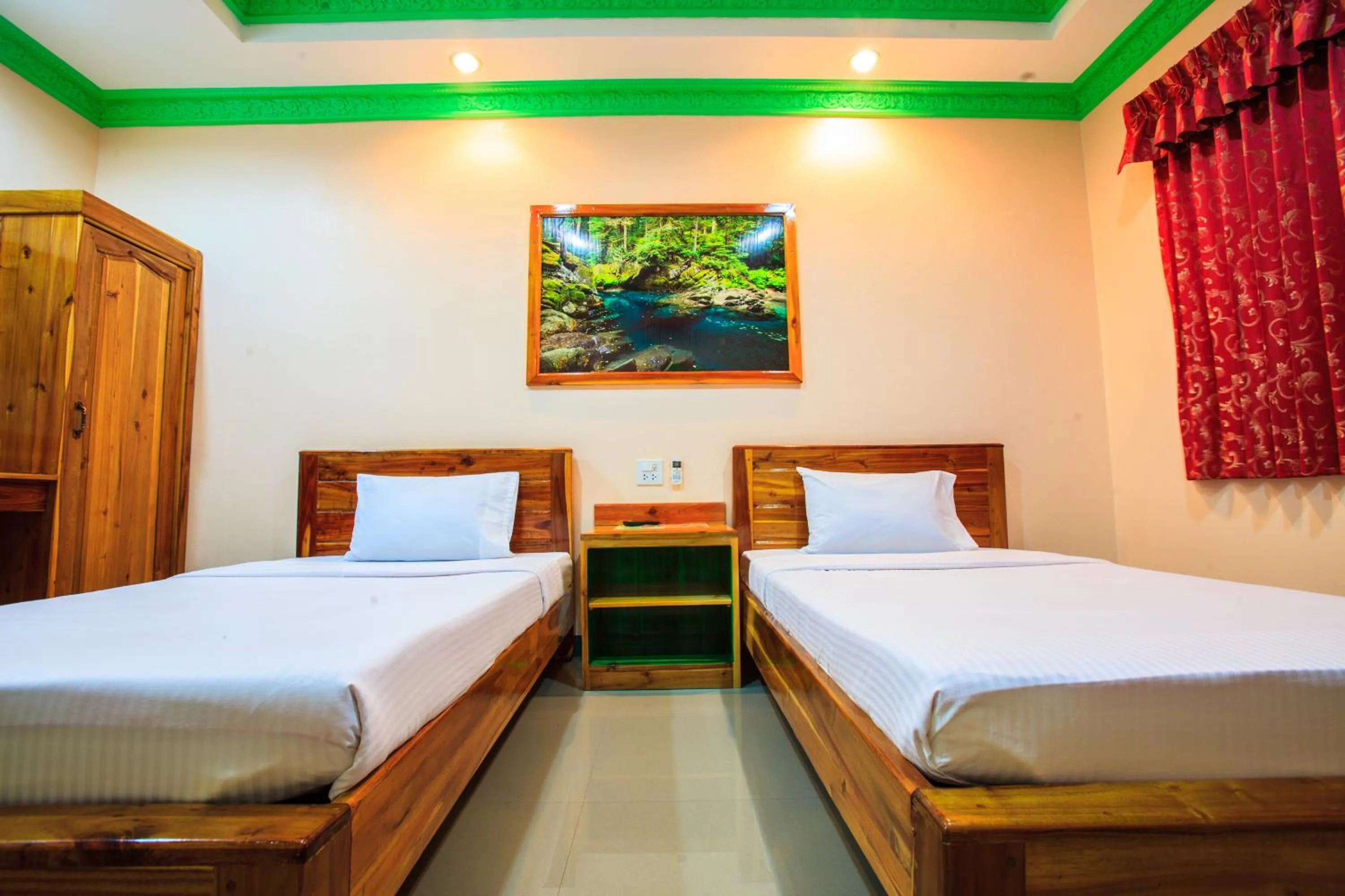 Bed in Pailin Resort