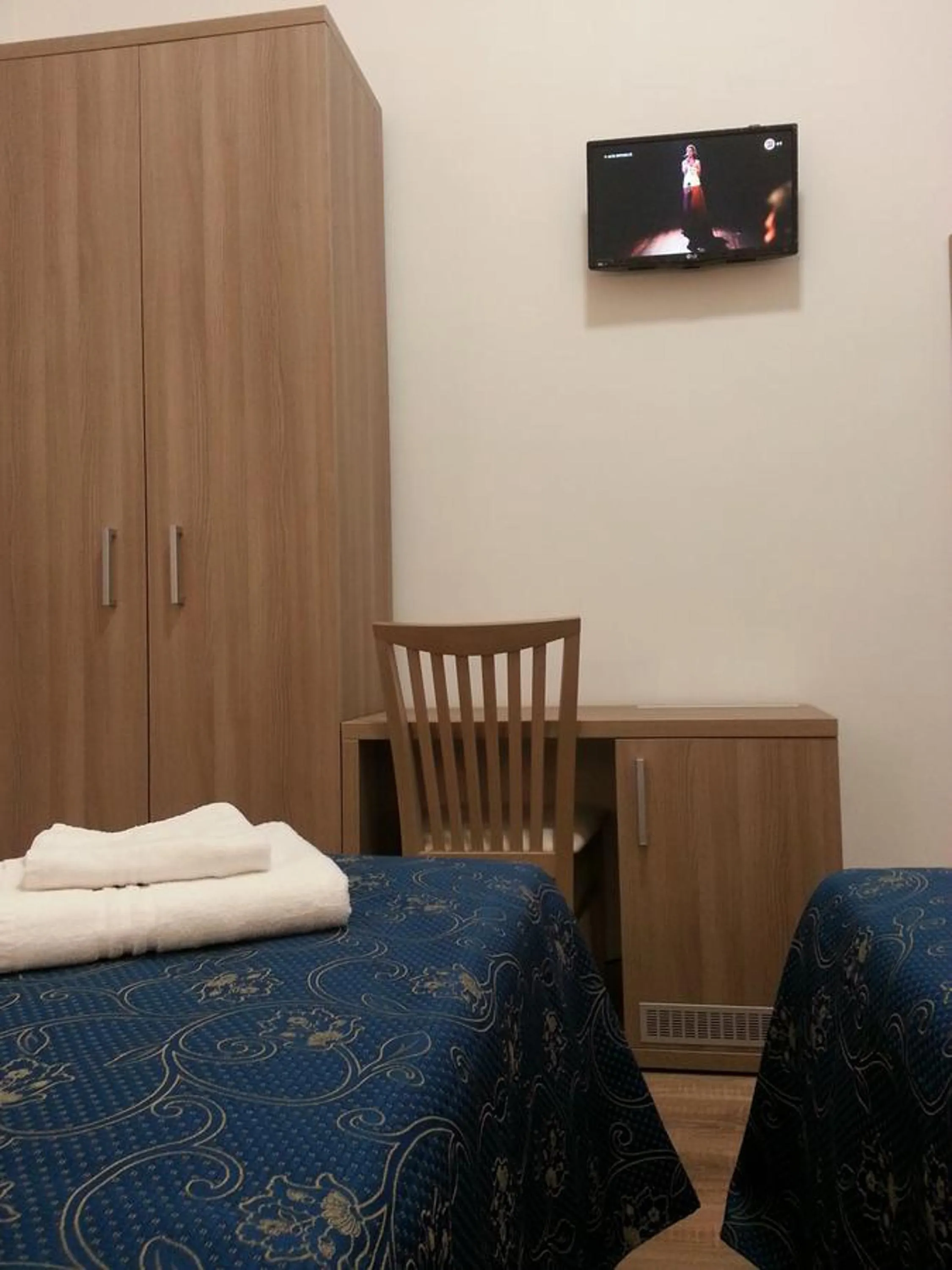 Living room, Bed in Marziah Inn