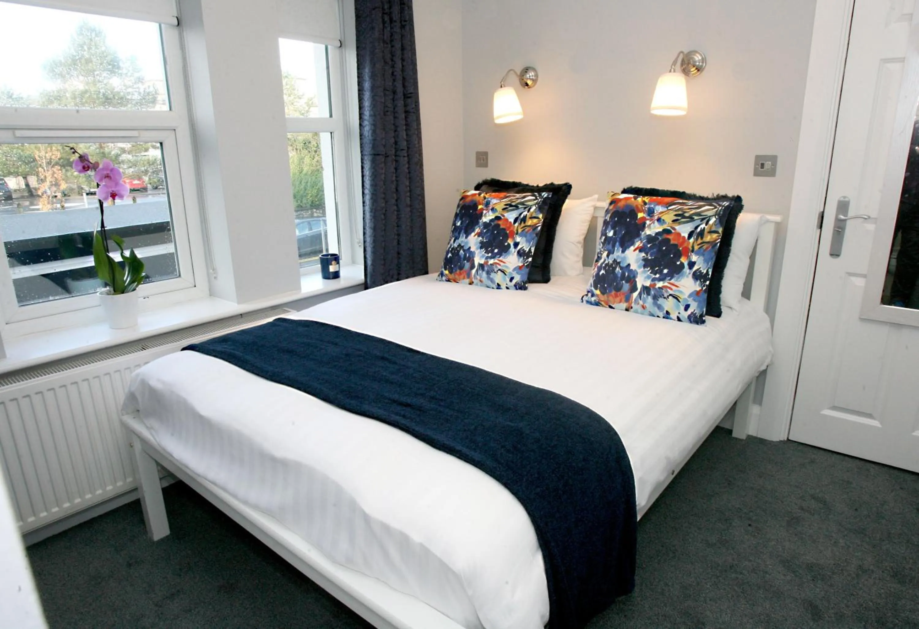 Bed in The Sliding Rock Inn