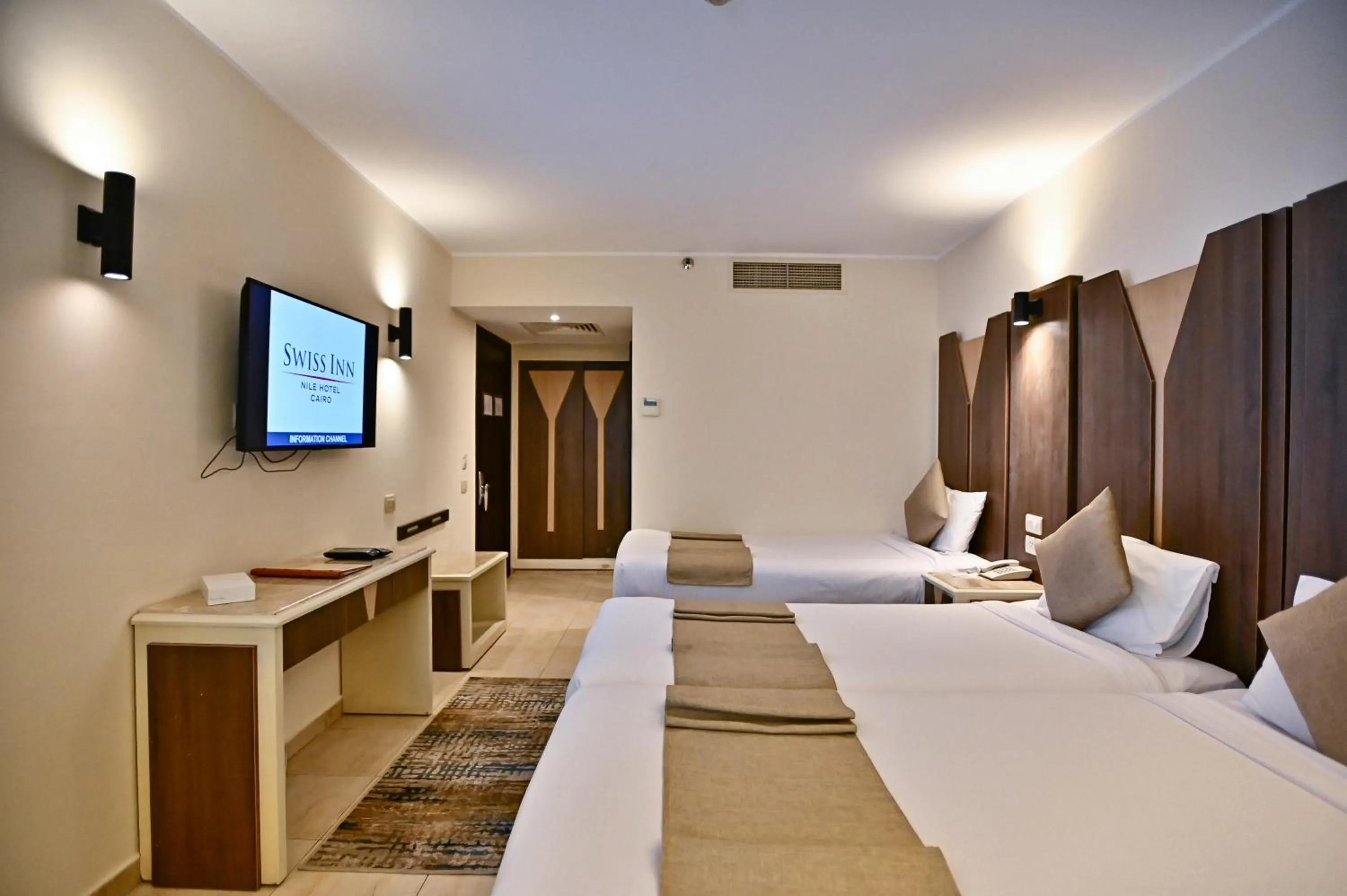 Photo of the whole room, Bed in Swiss Inn Nile Hotel