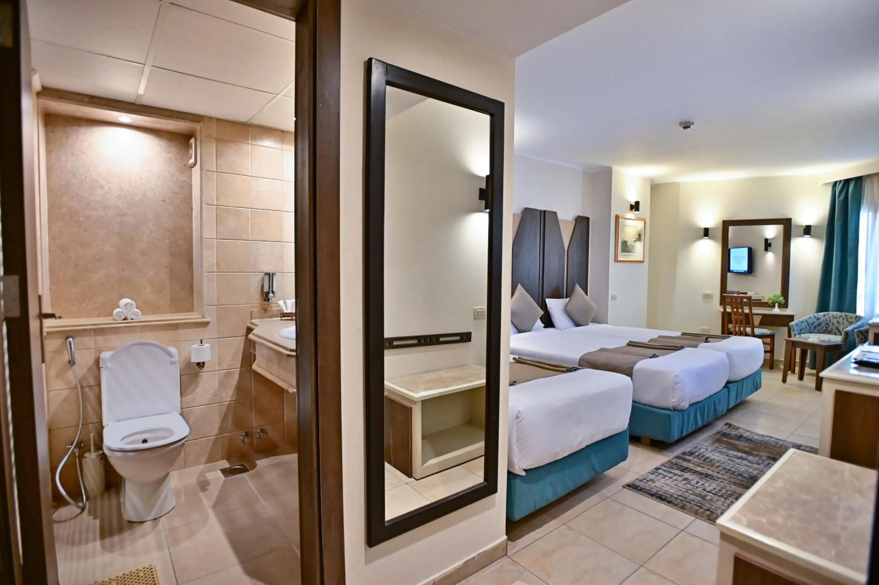 Toilet, Bed in Swiss Inn Nile Hotel