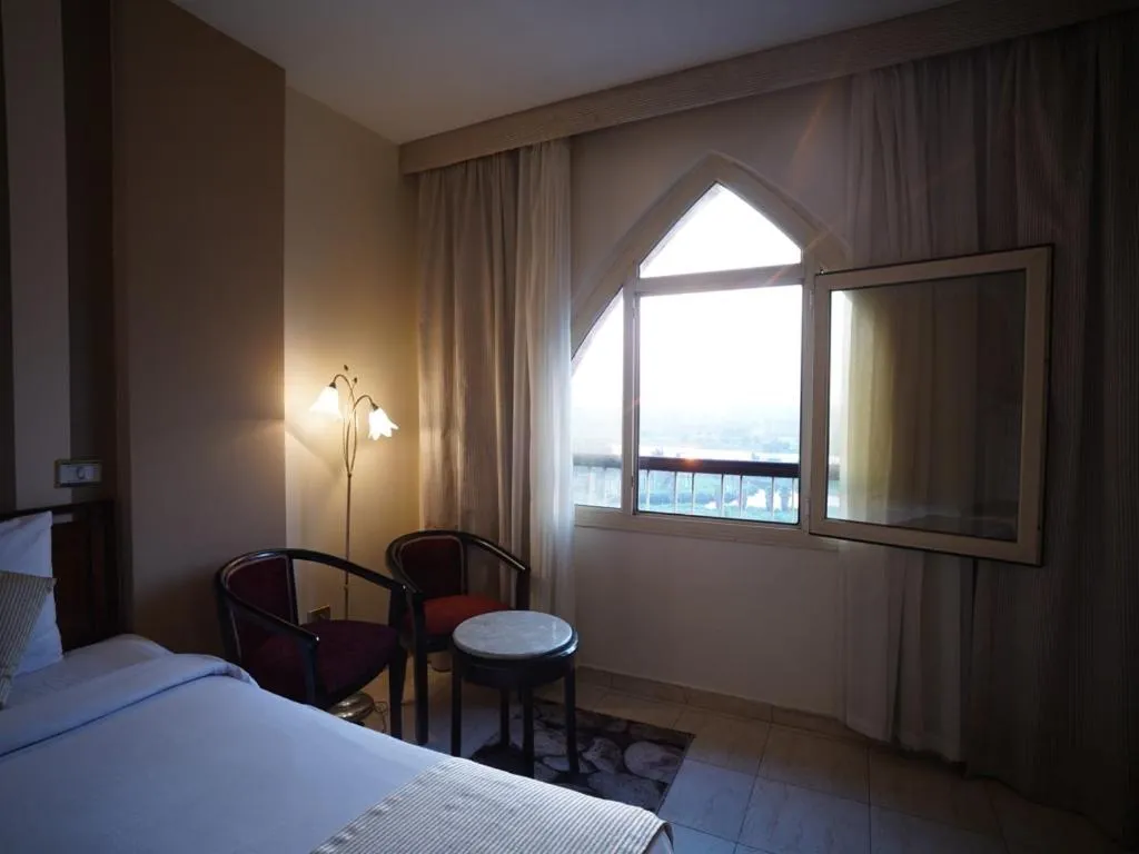 Photo of the whole room, Bed in Swiss Inn Nile Hotel