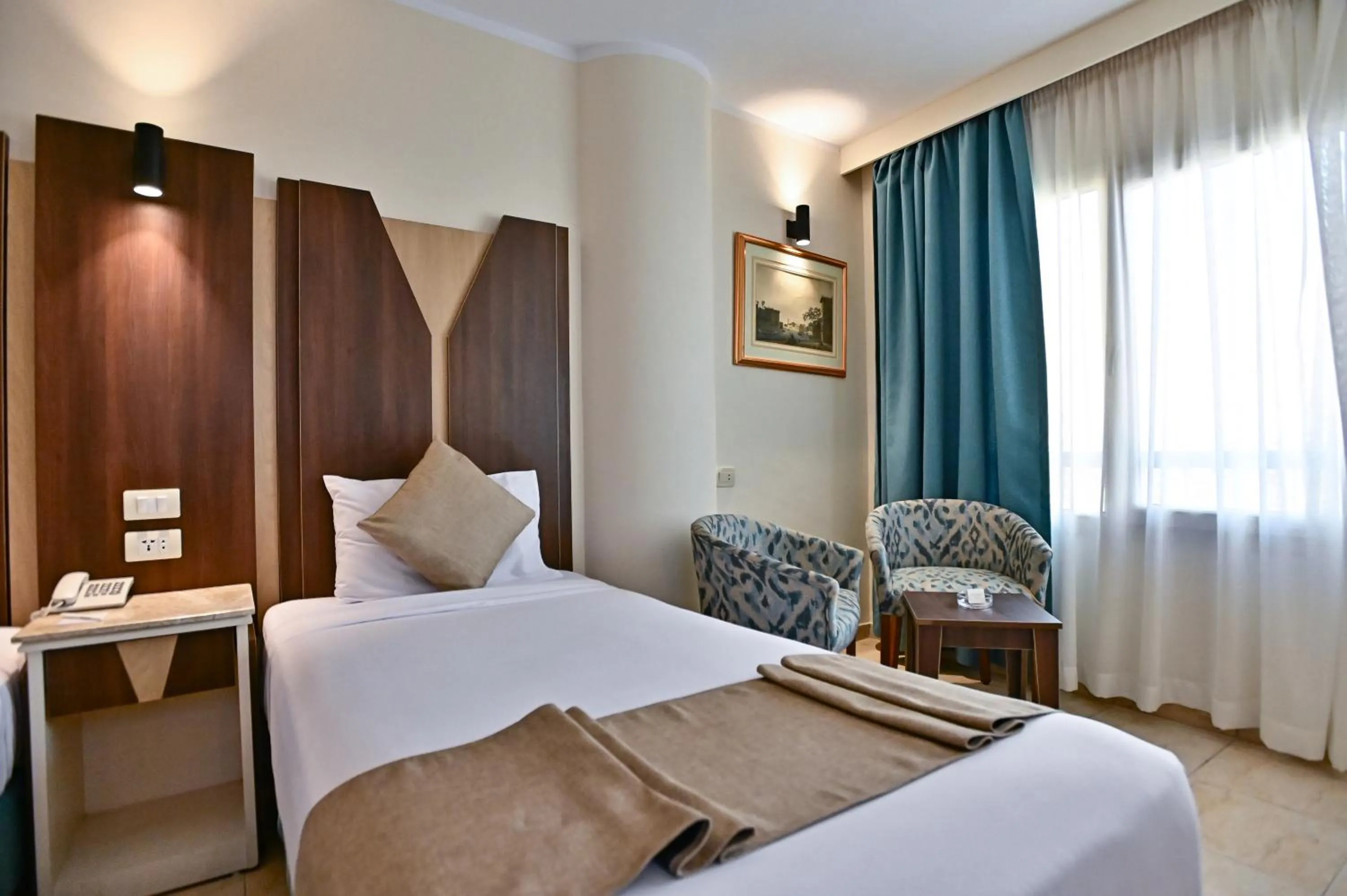 Photo of the whole room, Bed in Swiss Inn Nile Hotel