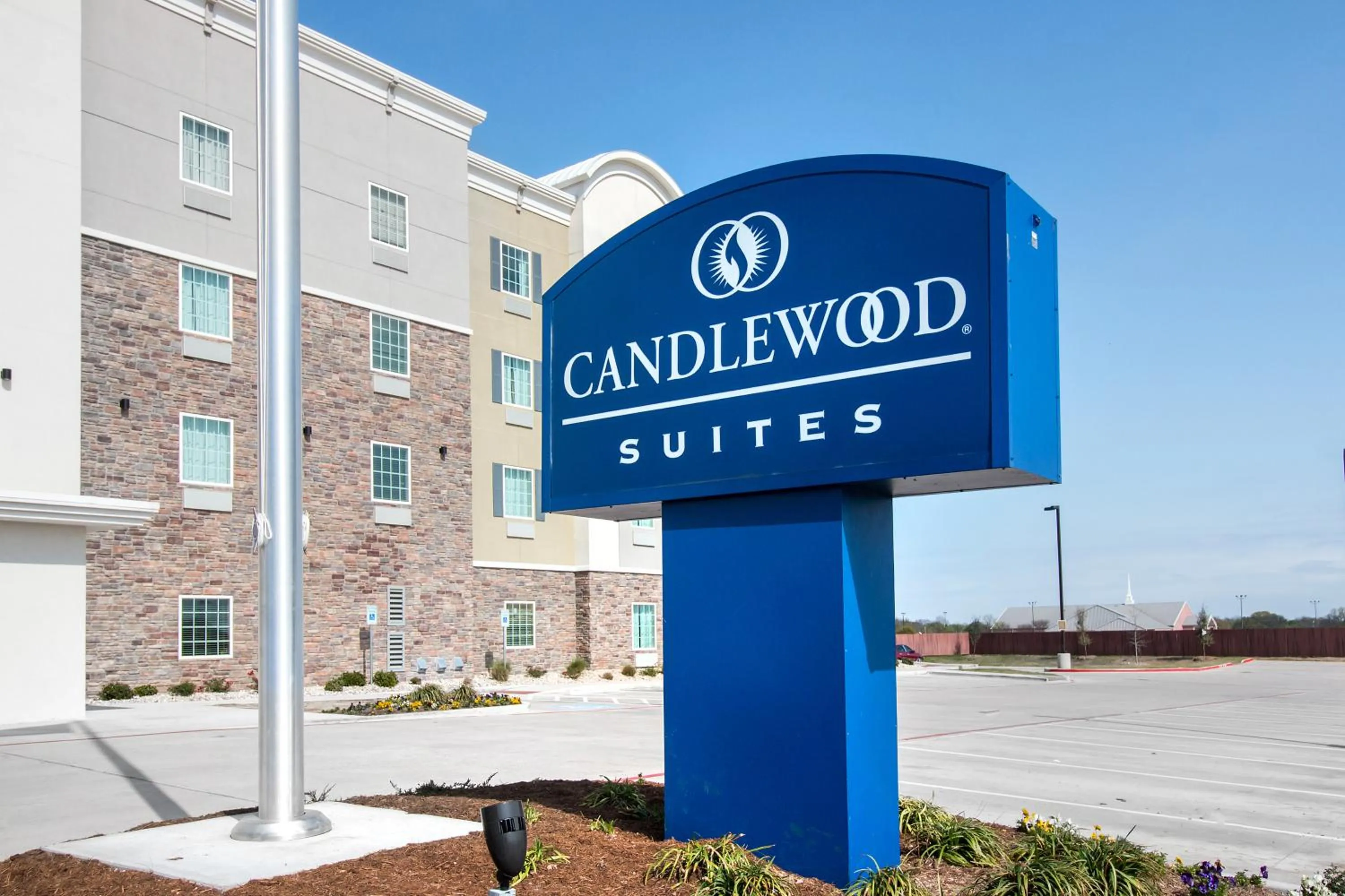 Property logo or sign in Candlewood Suites Waco by IHG