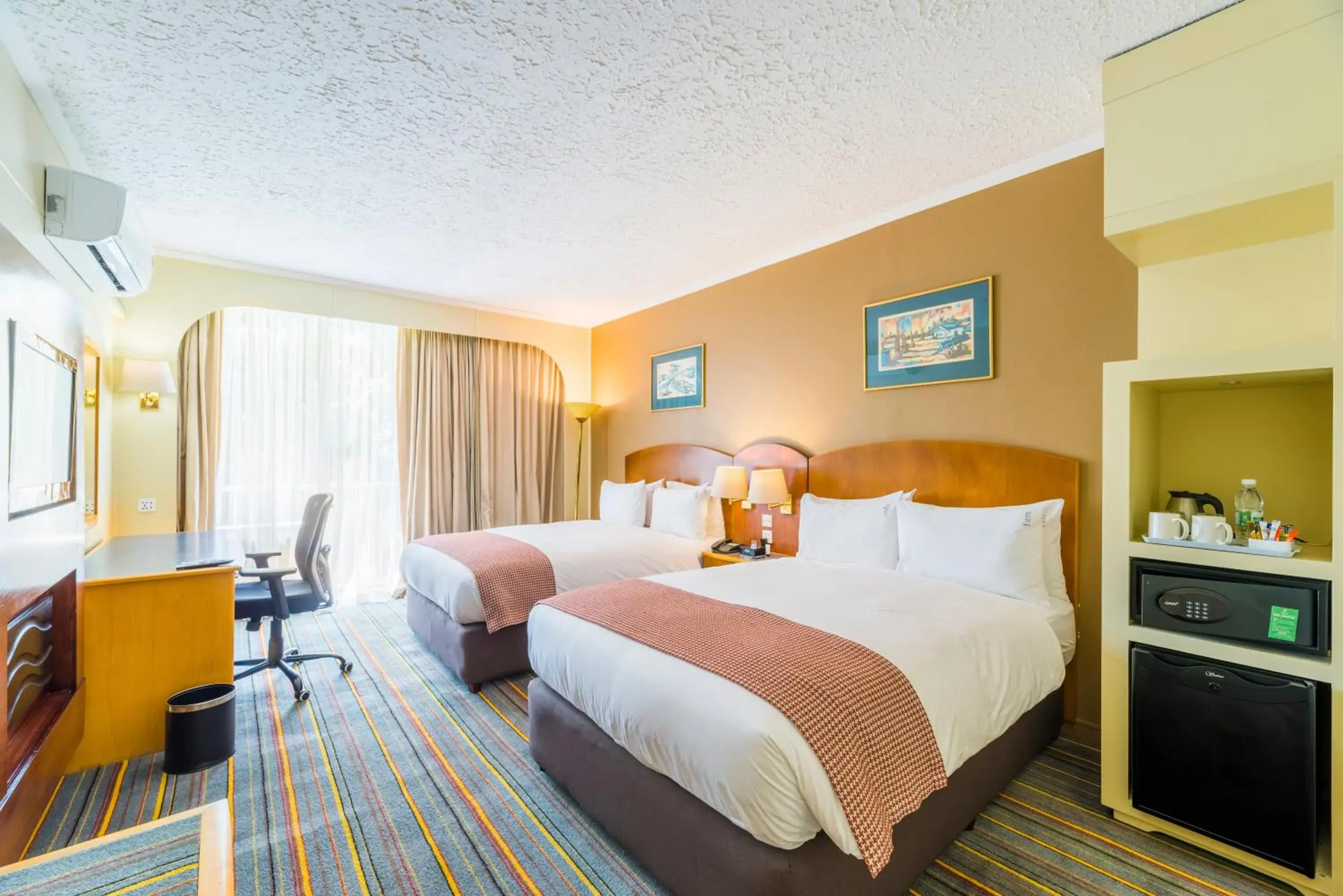 Bedroom, Bed in Holiday Inn - Bulawayo by IHG Bedroom, Bed in Holiday Inn - Bulawayo by IHG