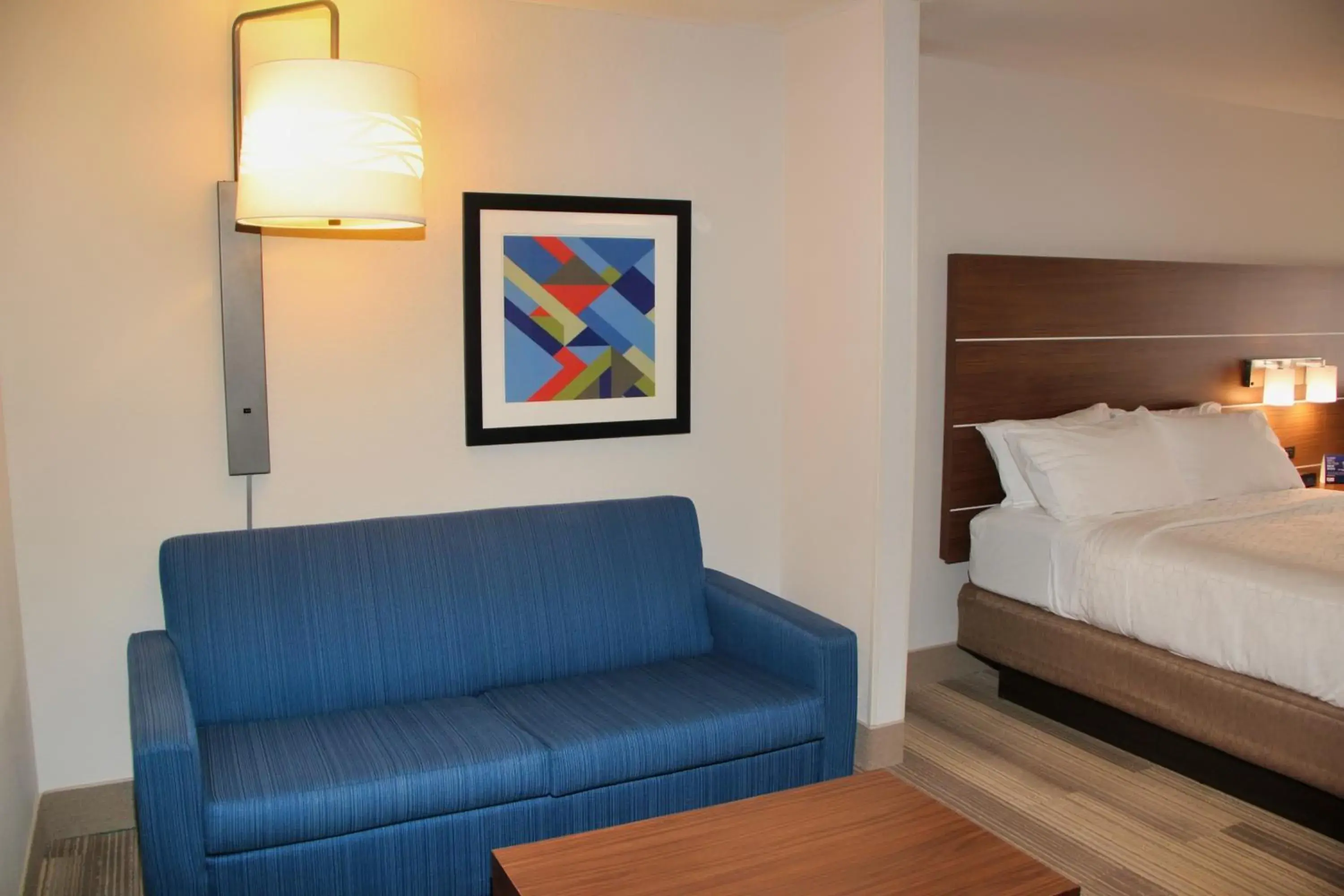 Living room, Bed in Holiday Inn Express by IHG Living room, Bed in Holiday Inn Express by IHG