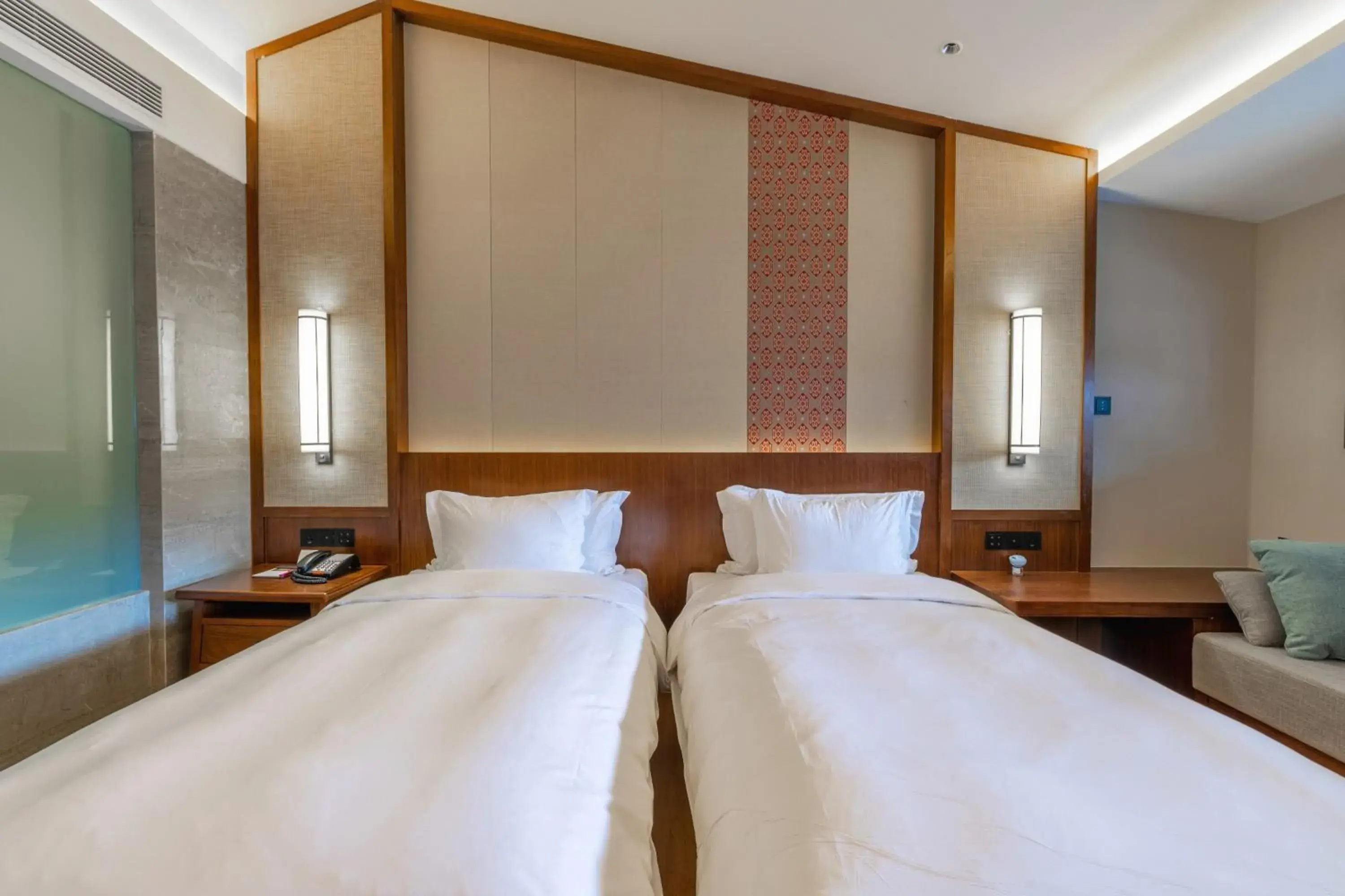 Bed in Howard Johnson Neodalle Resort Zhangjiajie Bed in Howard Johnson Neodalle Resort Zhangjiajie