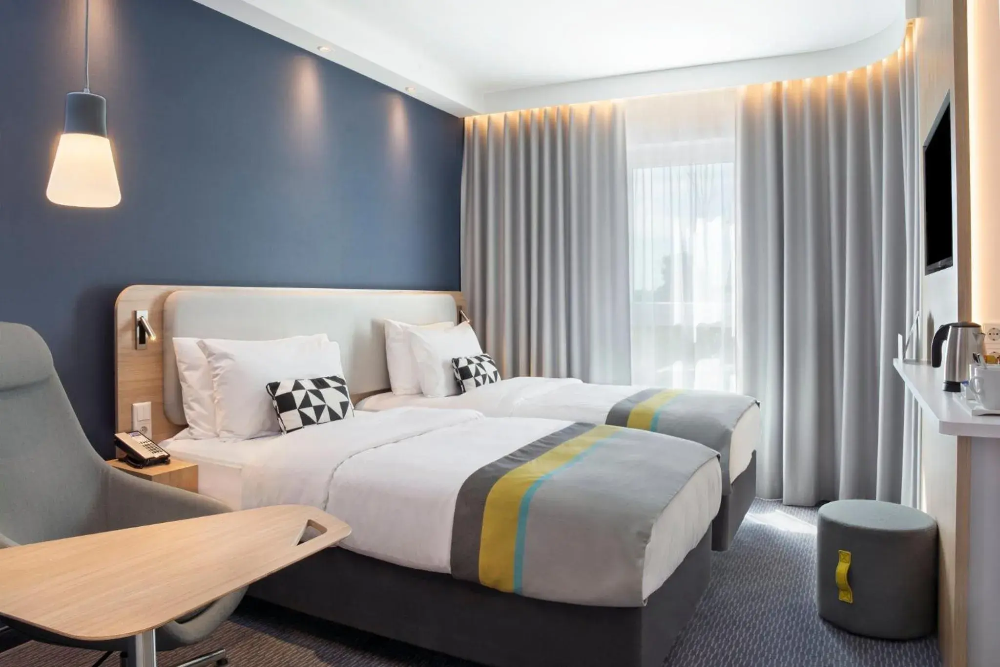 Photo of the whole room, Bed in Holiday Inn Express Karlsruhe - City Park by IHG Photo of the whole room, Bed in Holiday Inn Express Karlsruhe - City Park by IHG