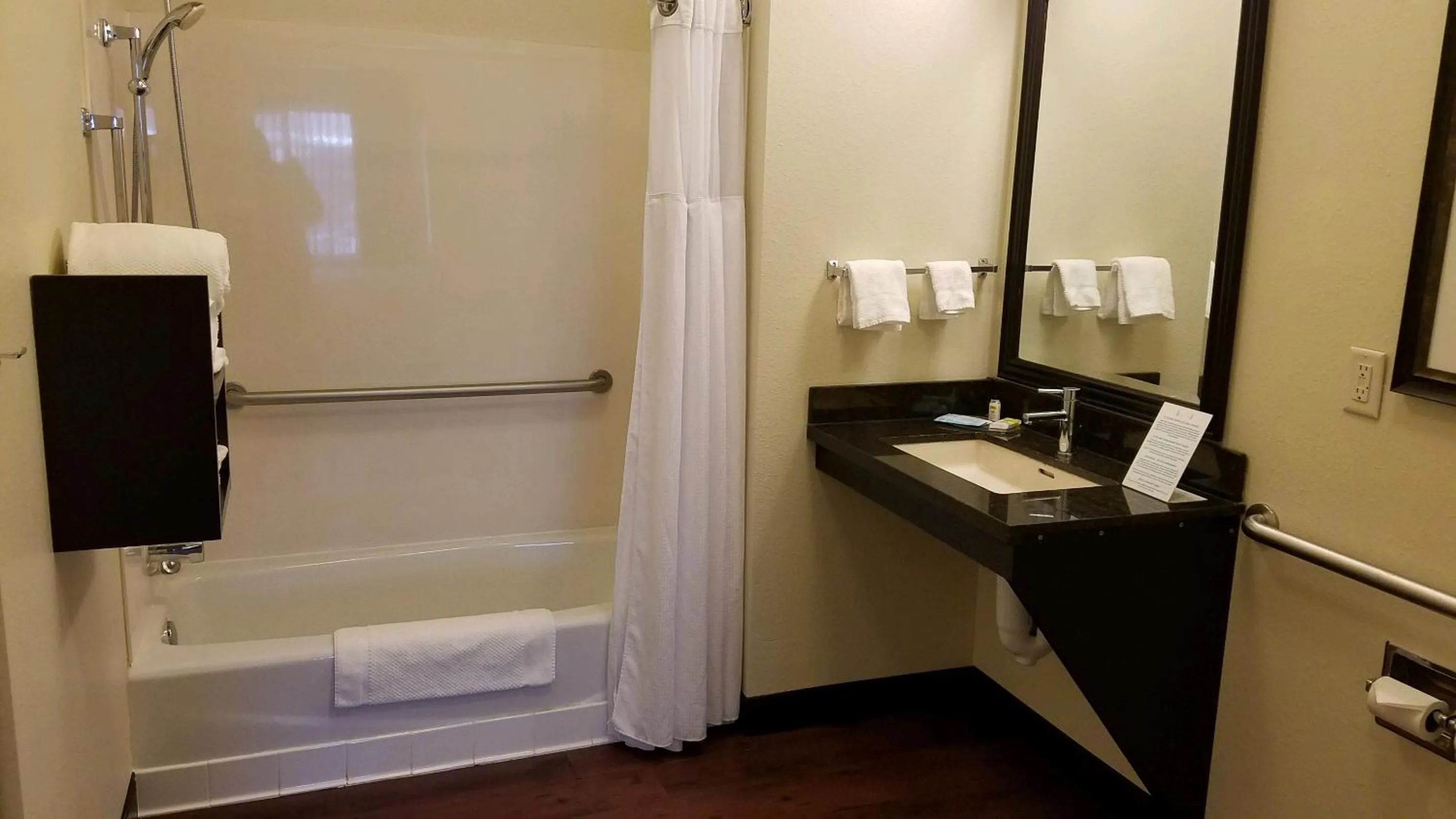 Bathroom in Staybridge Suites Sioux Falls at Empire Mall by IHG