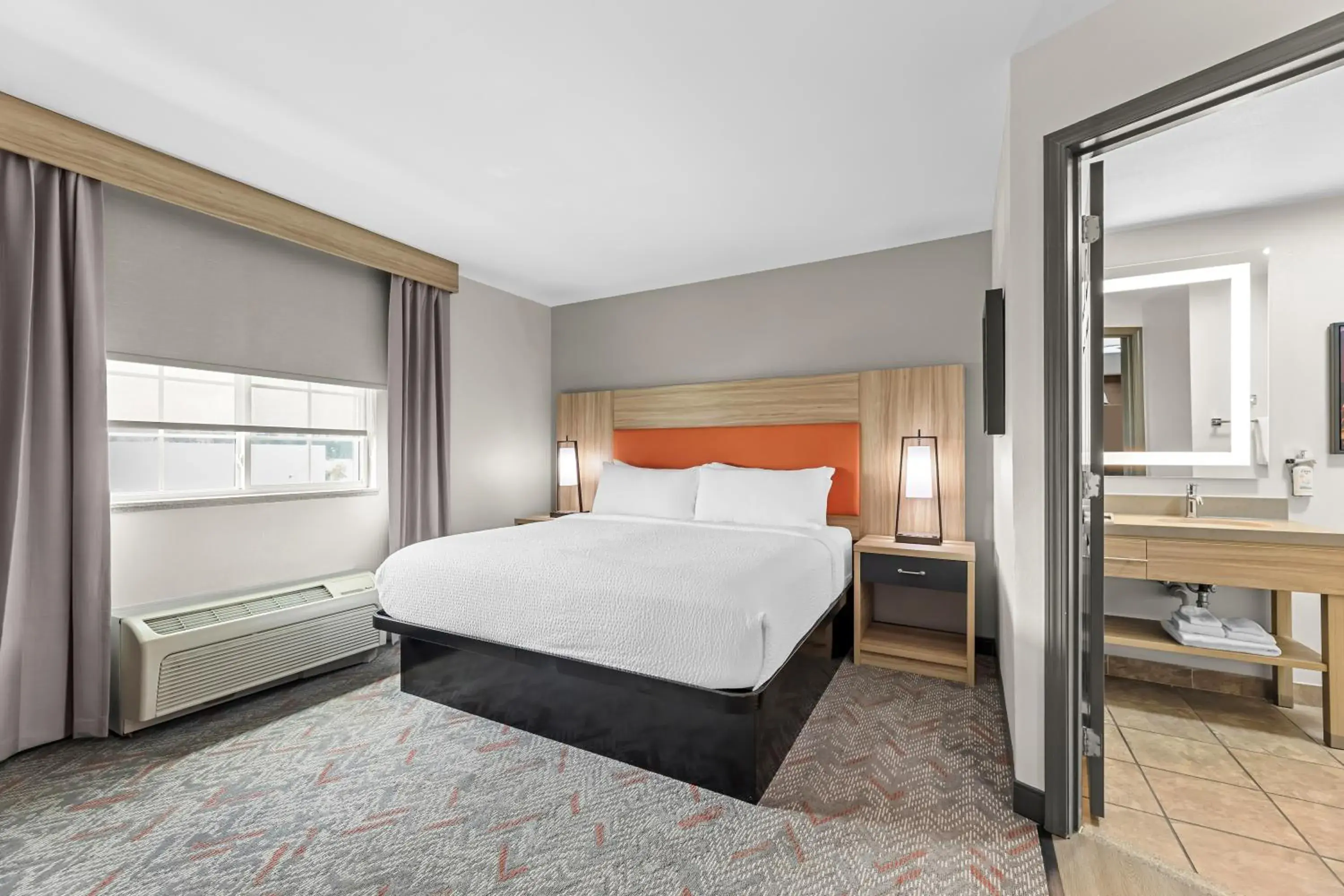 Bed in Candlewood Suites Flowood, MS by IHG Bed in Candlewood Suites Flowood, MS by IHG