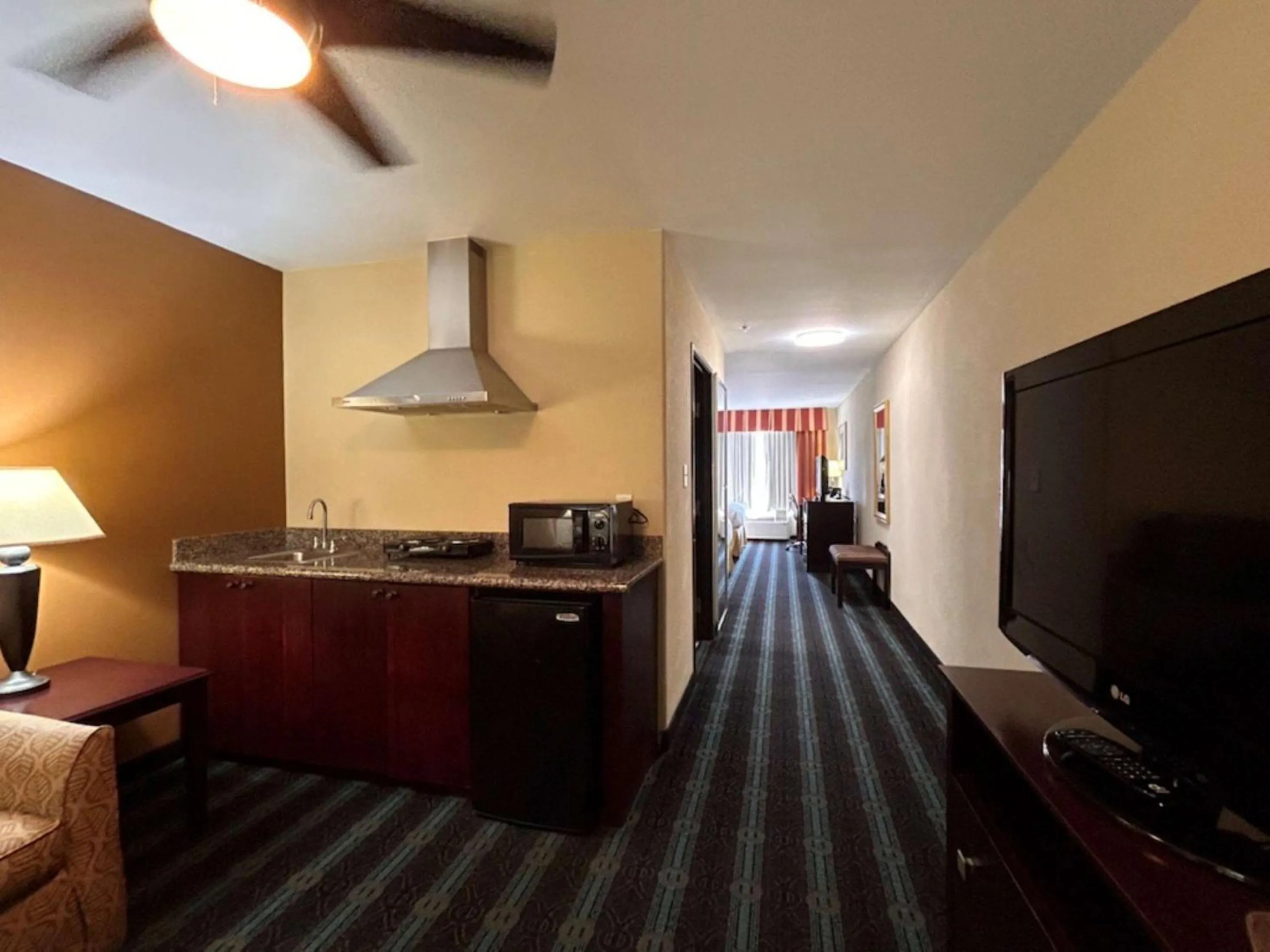 Bedroom in Express Inn Leesville Ft Johnson, SureStay Collection by Best Western