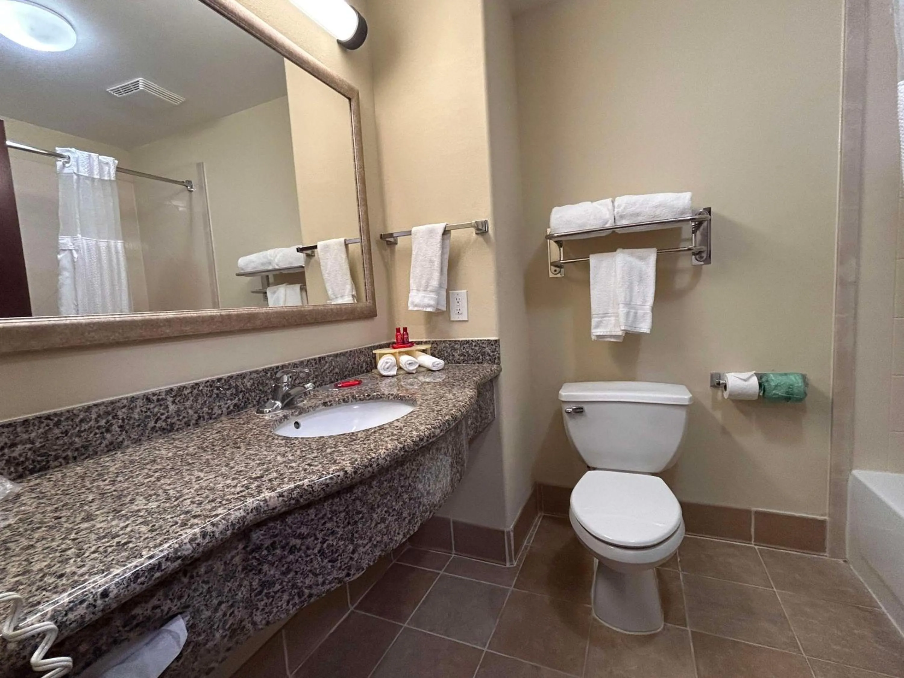 Bathroom in Express Inn Leesville Ft Johnson, SureStay Collection by Best Western