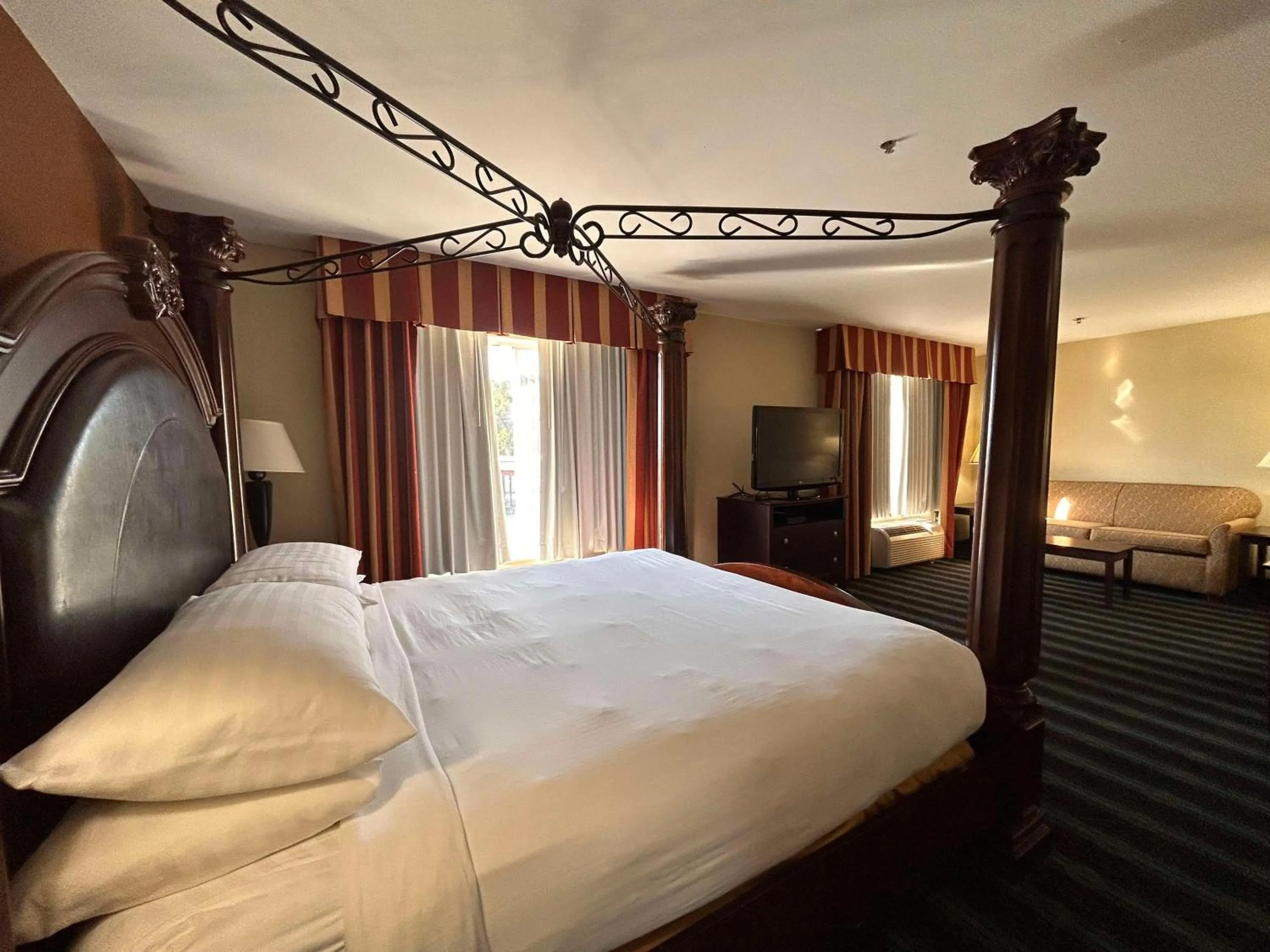 Bedroom, Bed in Express Inn Leesville Ft Johnson, SureStay Collection by Best Western