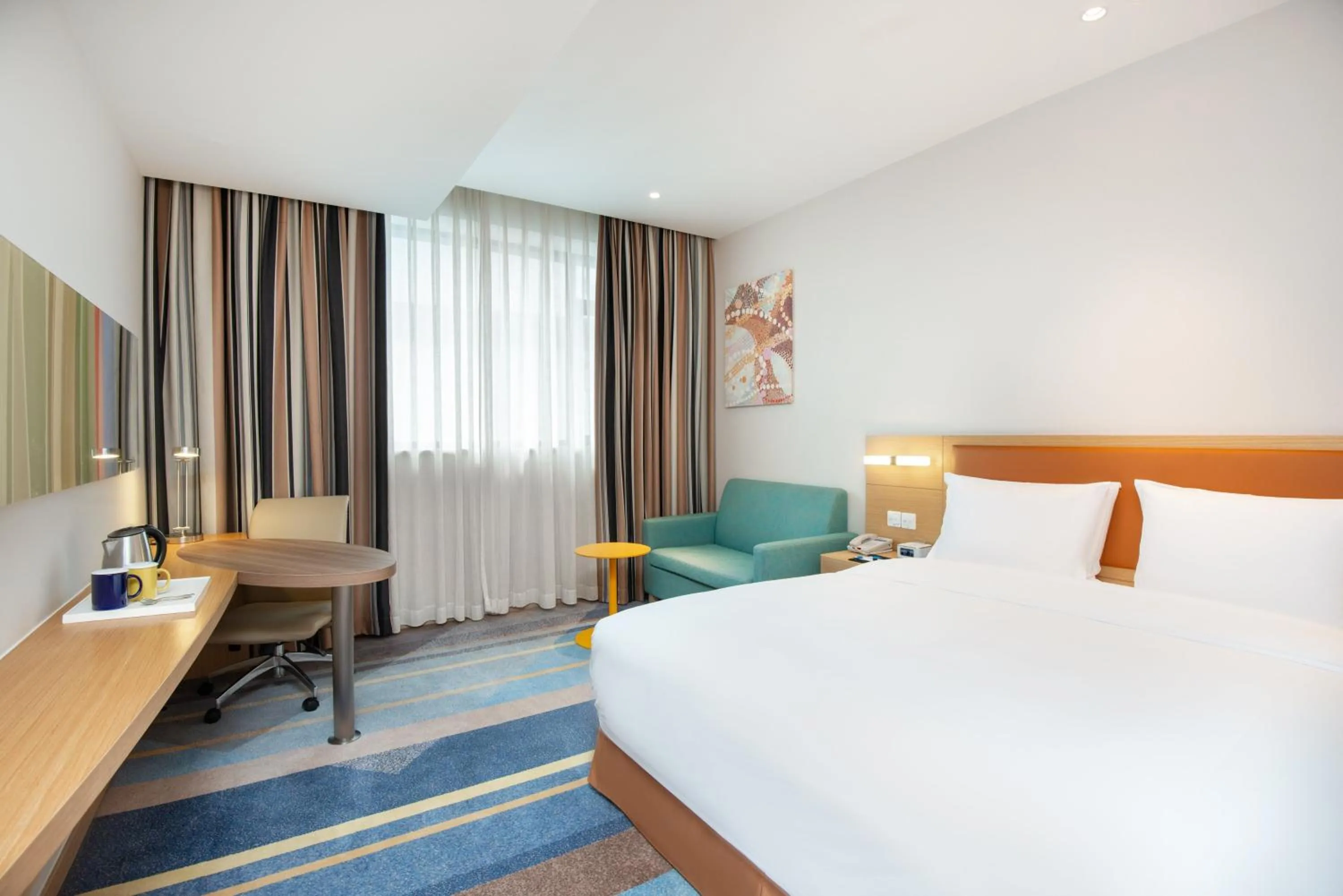 Photo of the whole room, Bed in Holiday Inn Express Shanghai Zhenping by IHG