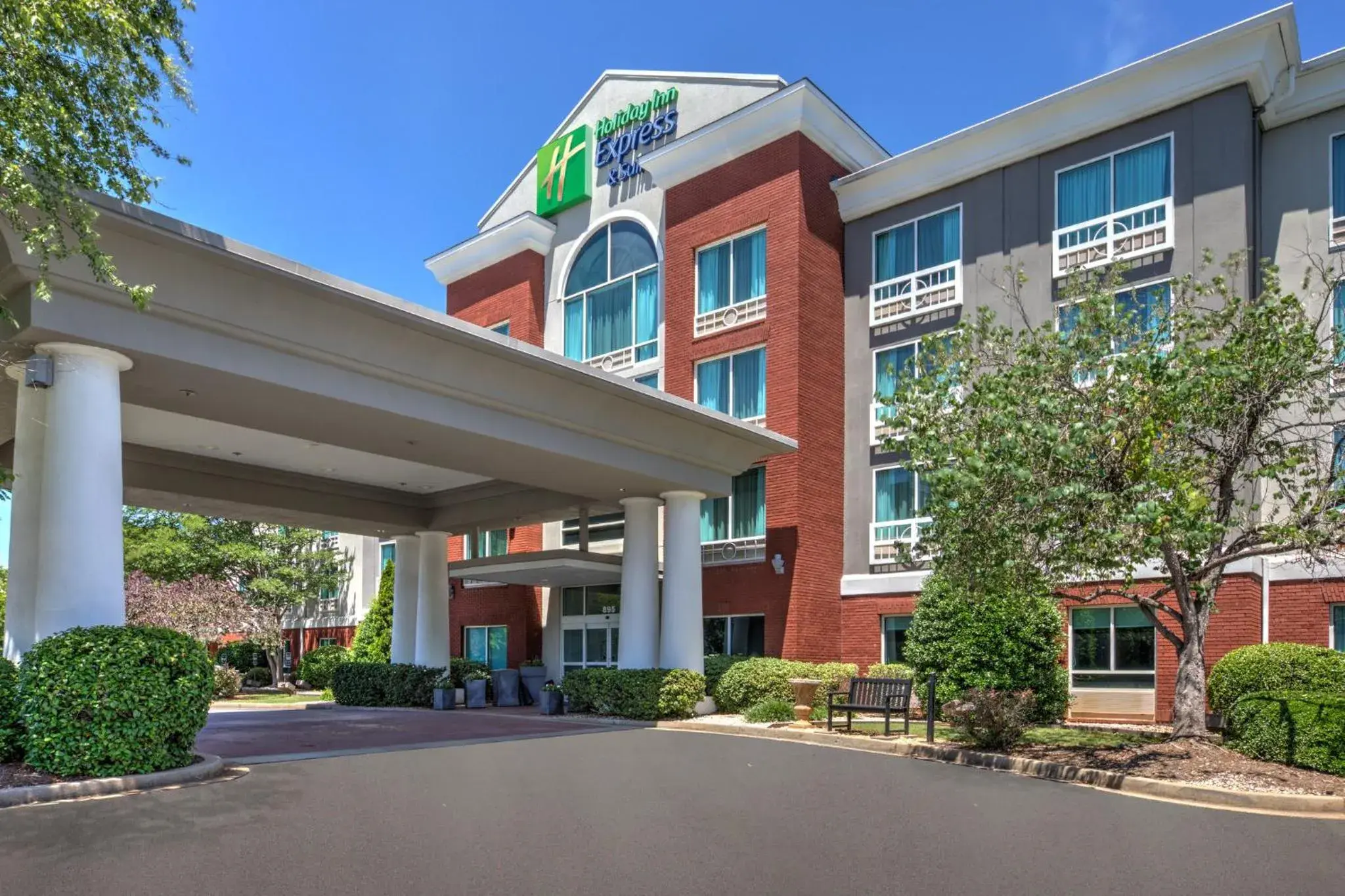 Property building in Holiday Inn Express & Suites I-26 & Us 29 At Westgate Mall by IHG Property building in Holiday Inn Express & Suites I-26 & Us 29 At Westgate Mall by IHG
