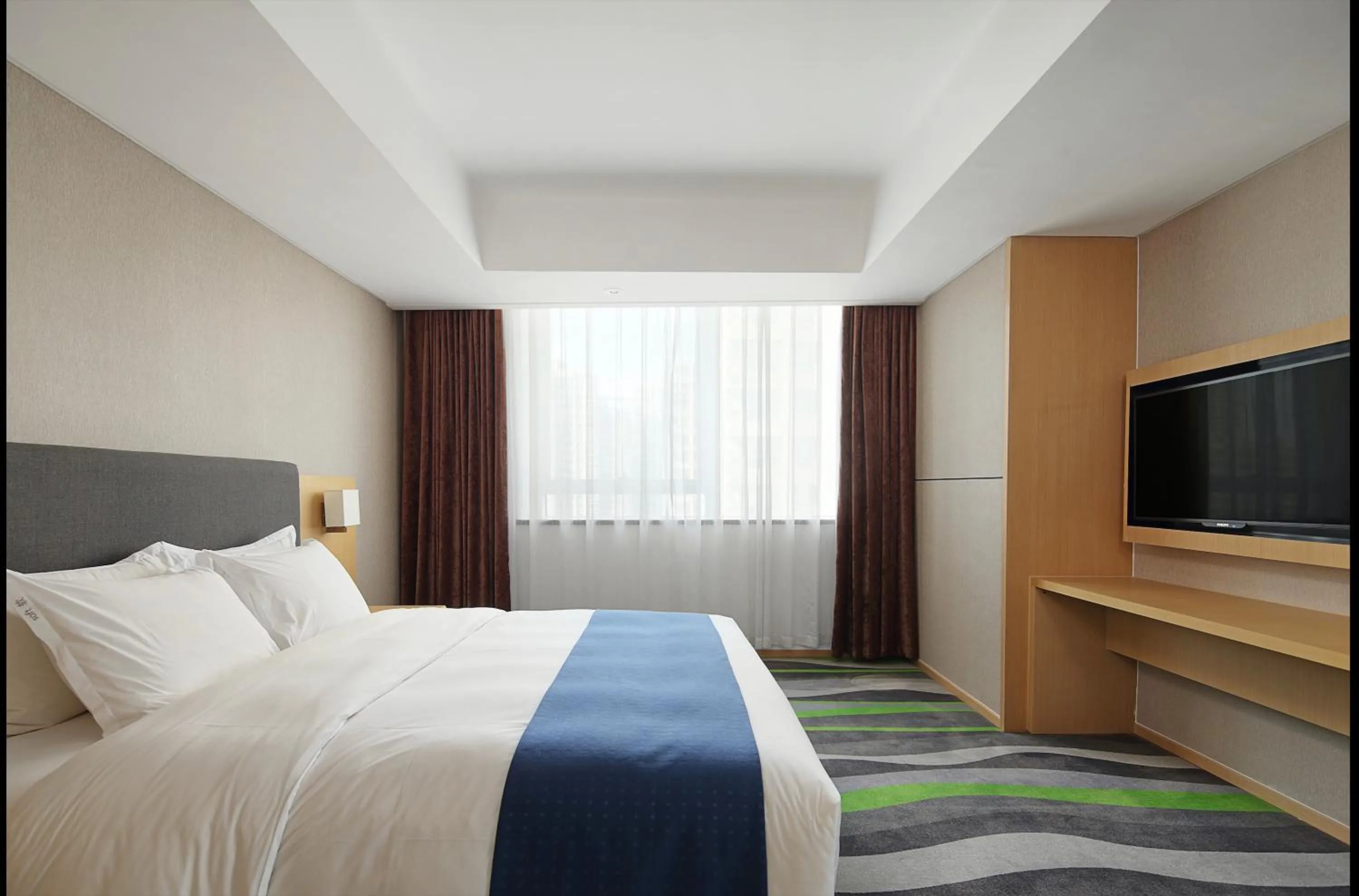 Bed in Holiday Inn Express Jinan High-Tech Zone by IHG