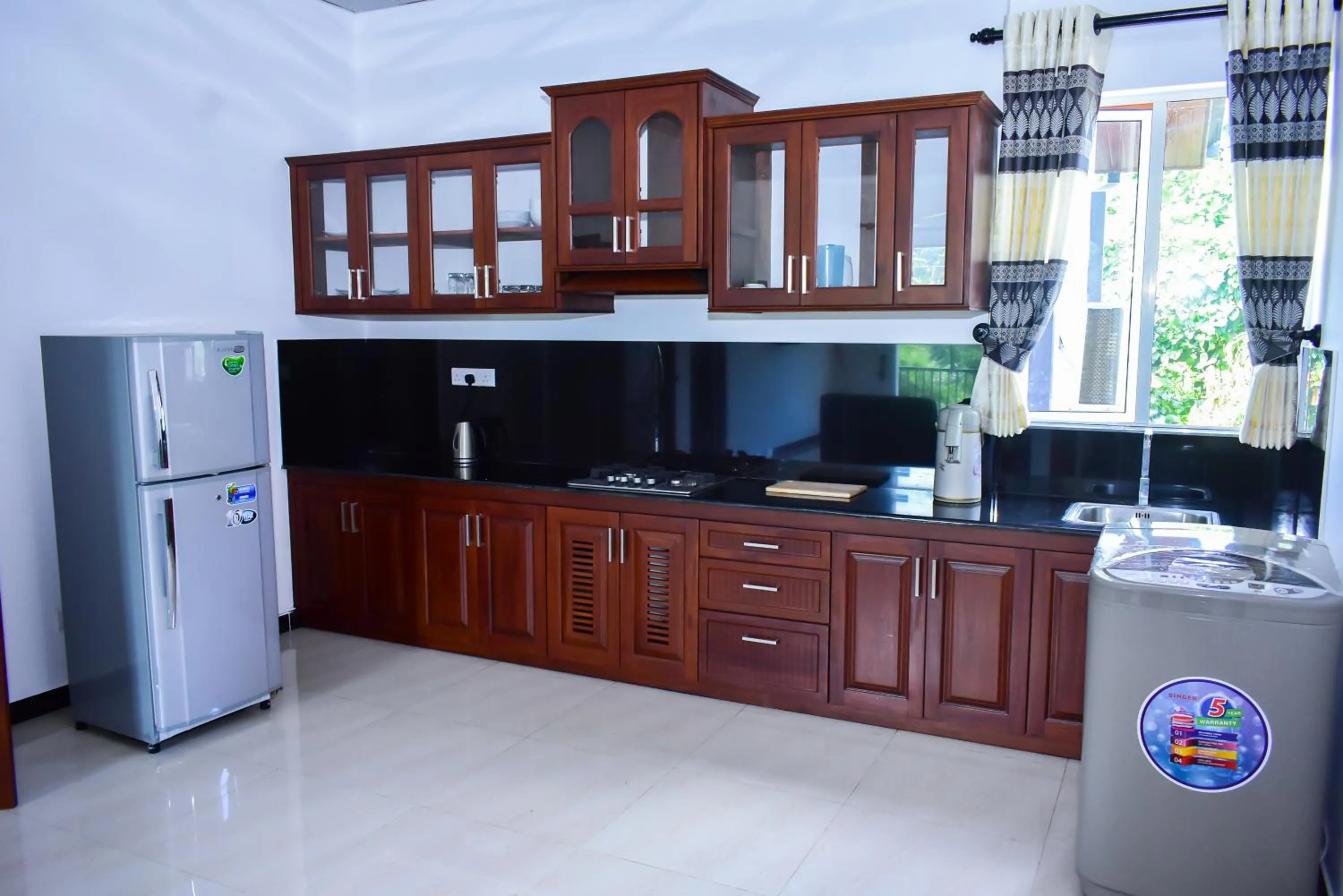 Kitchen or kitchenette in Minuri Villa