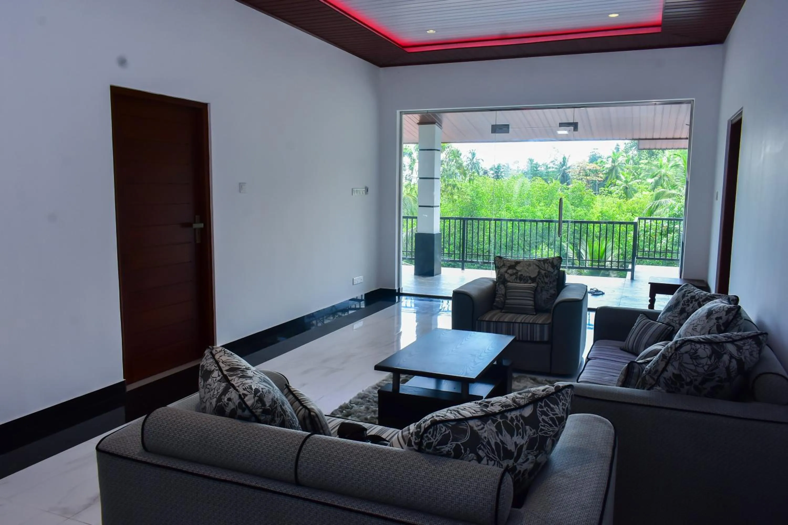 Communal lounge/ TV room in Minuri Villa