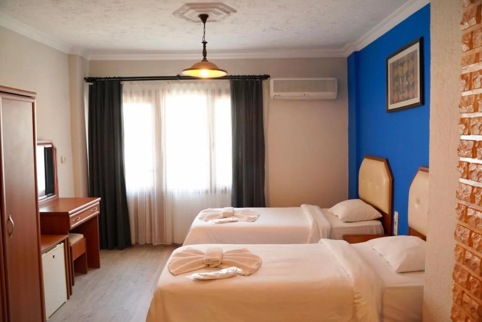 Bed in Rebetika Hotel & bistro