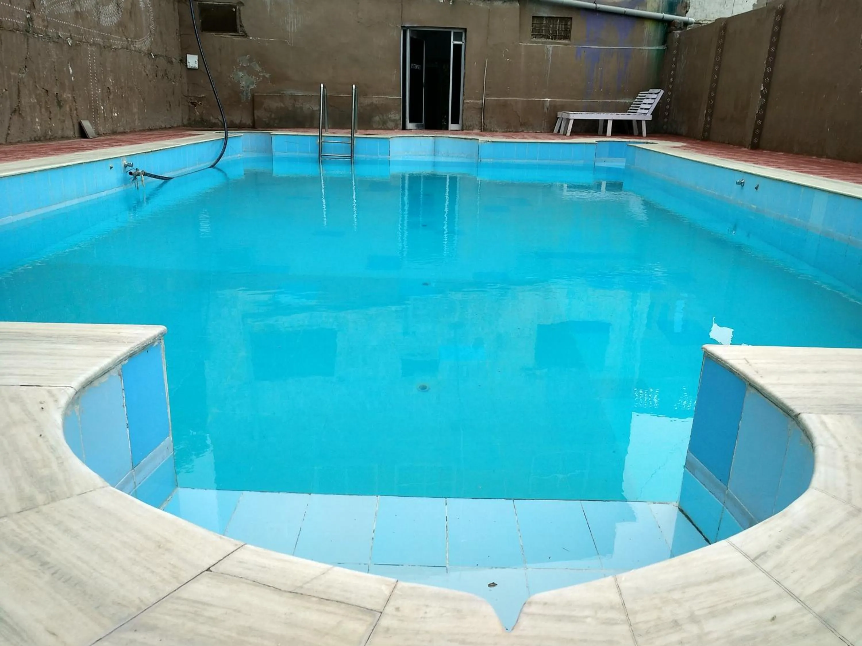 Swimming pool in Radhika Palace Hotel