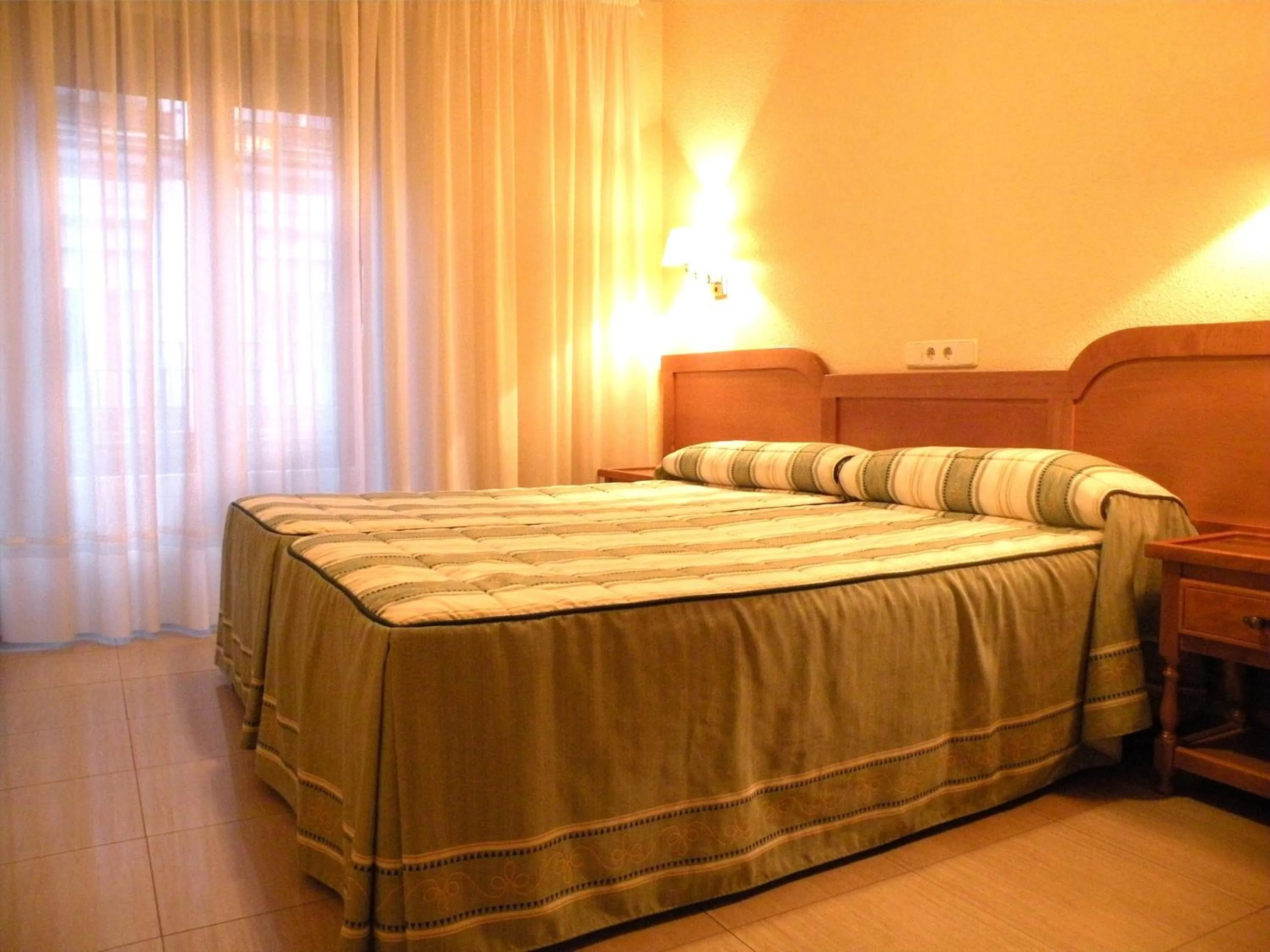 Photo of the whole room, Bed in Hostal Benamar