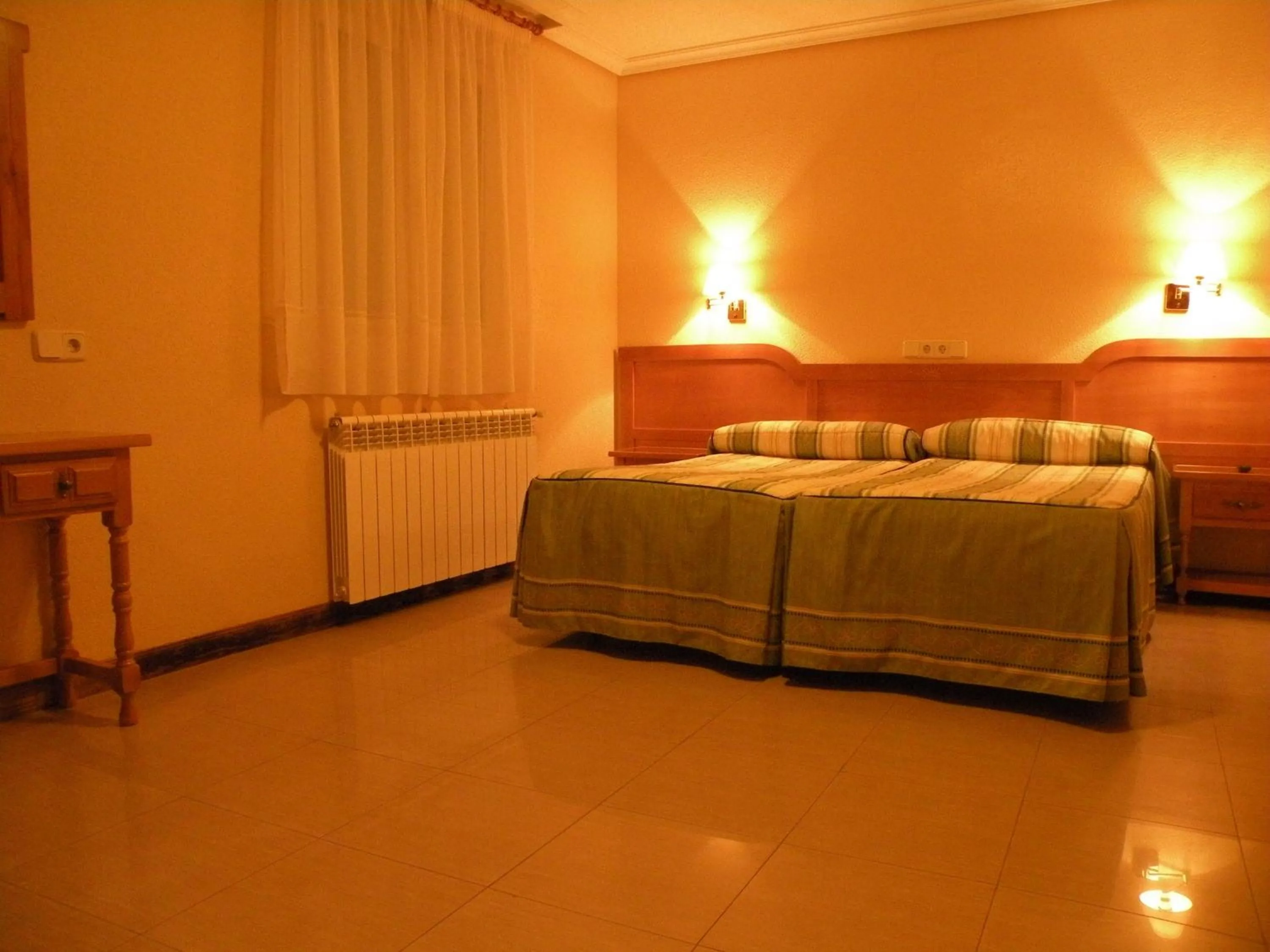 Photo of the whole room, Bed in Hostal Benamar