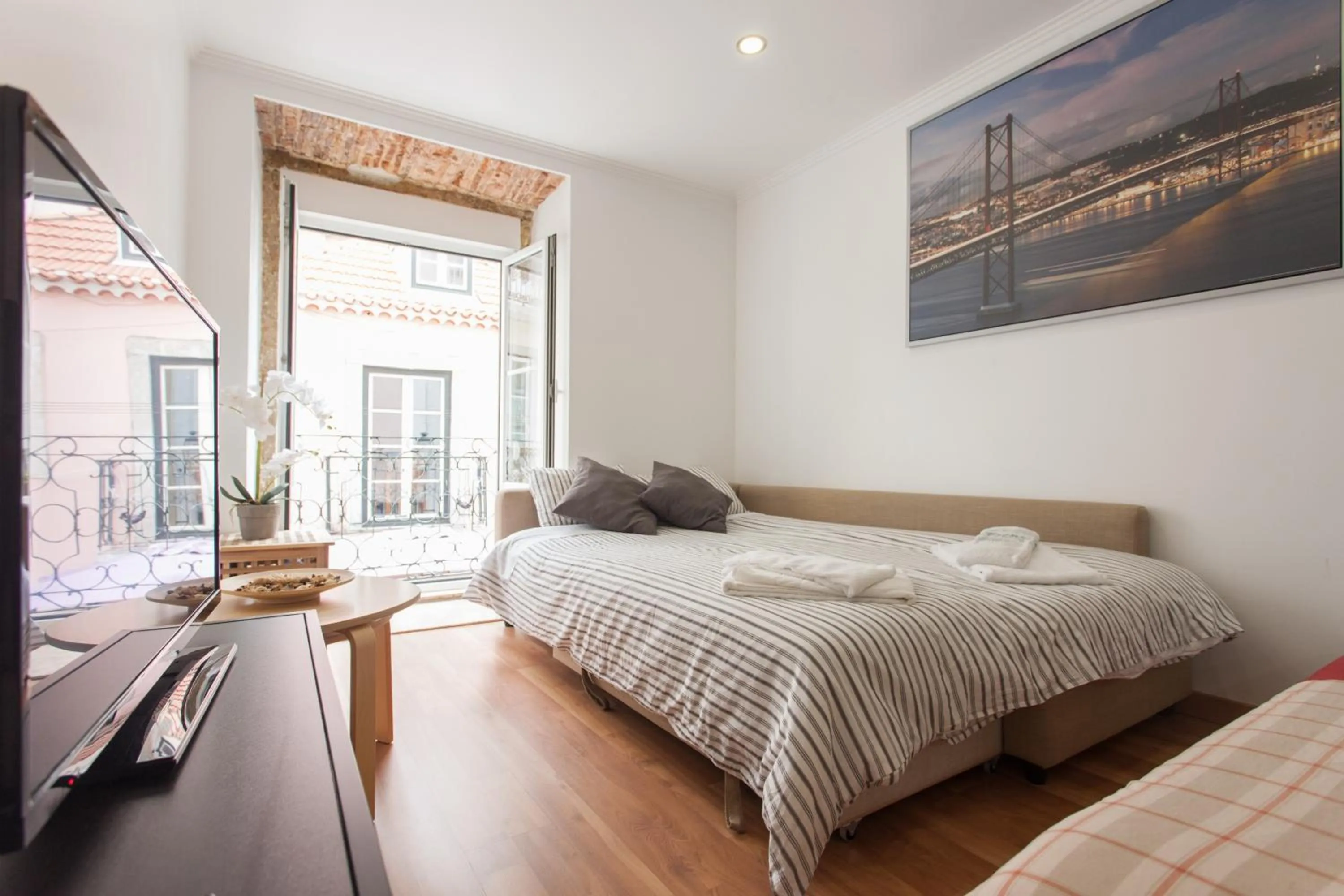 Living room, Bed in Apartments Center Bairro Alto