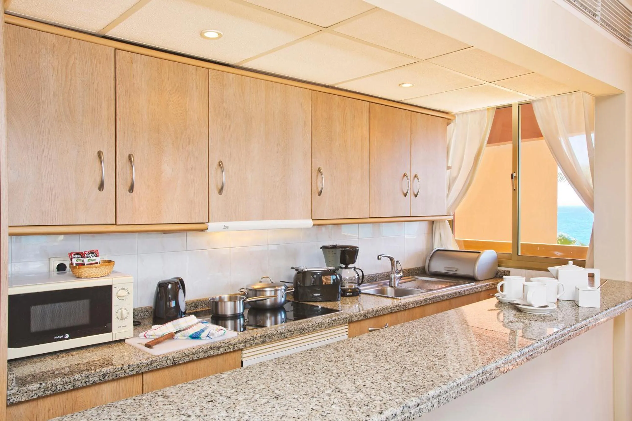 Kitchen or kitchenette in Sunset Beach Club Hotel Apartments