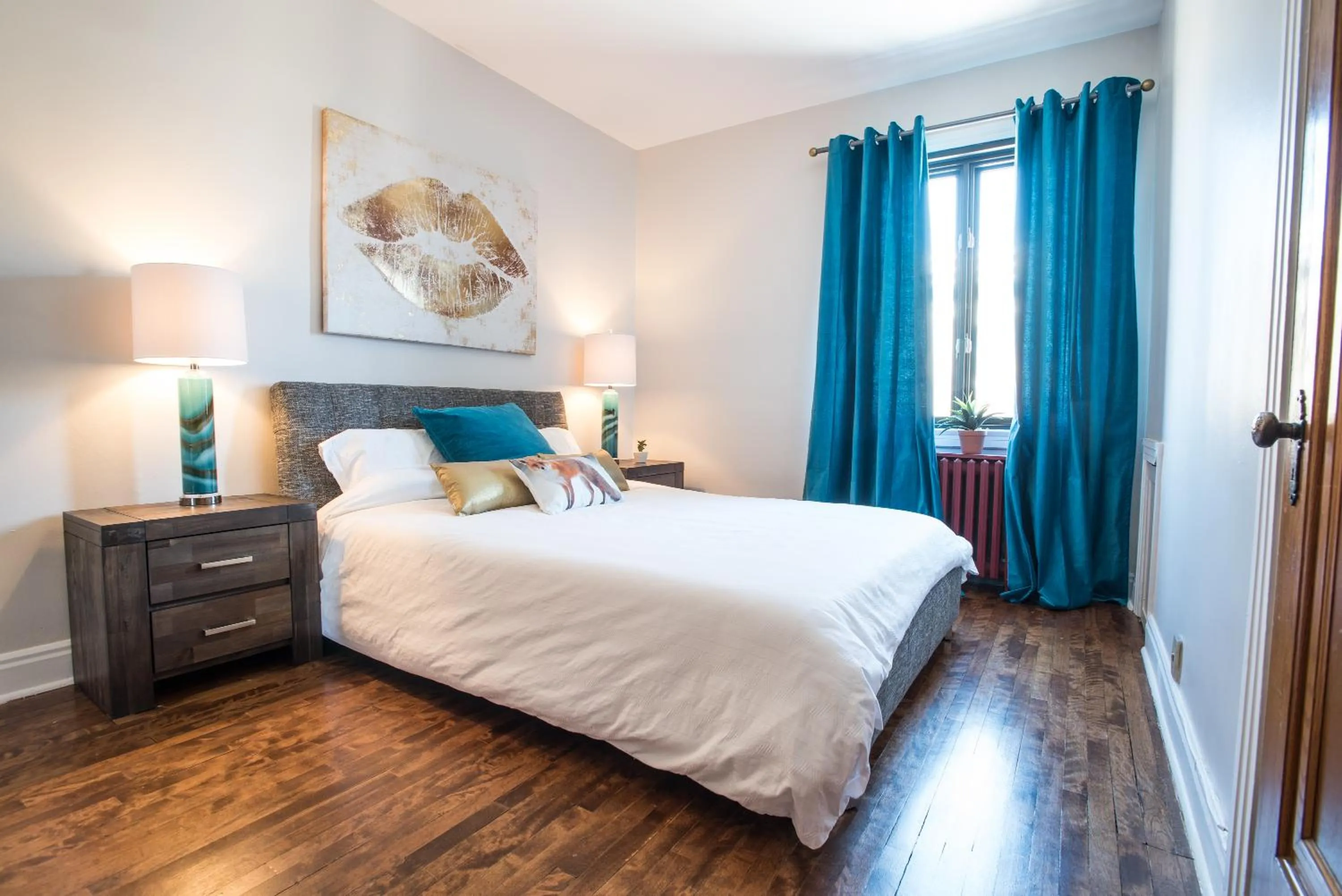 Bed in MTLVacationrentals-The MTLVR Kisses