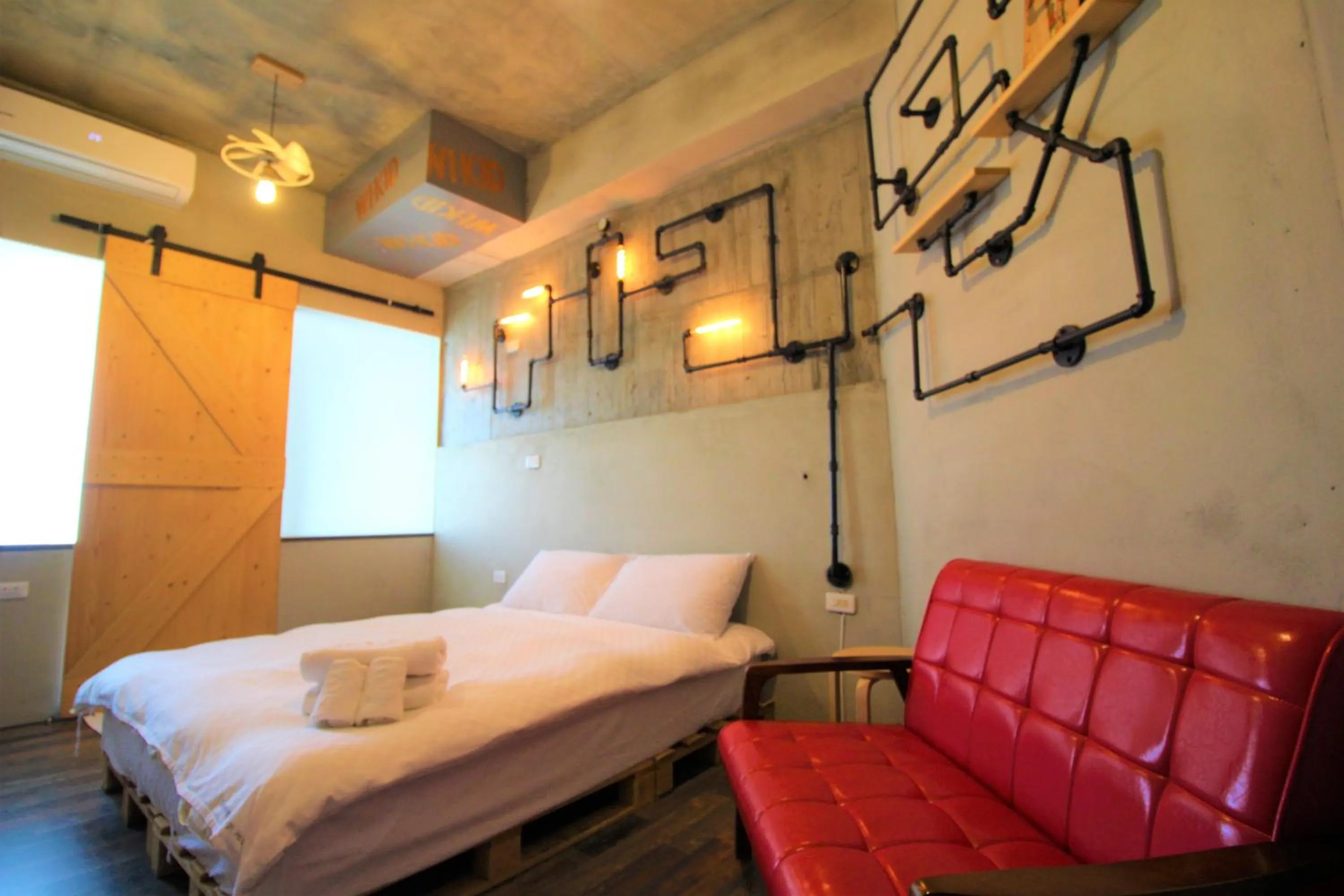 Bed in Anping Wikid Design Hotel