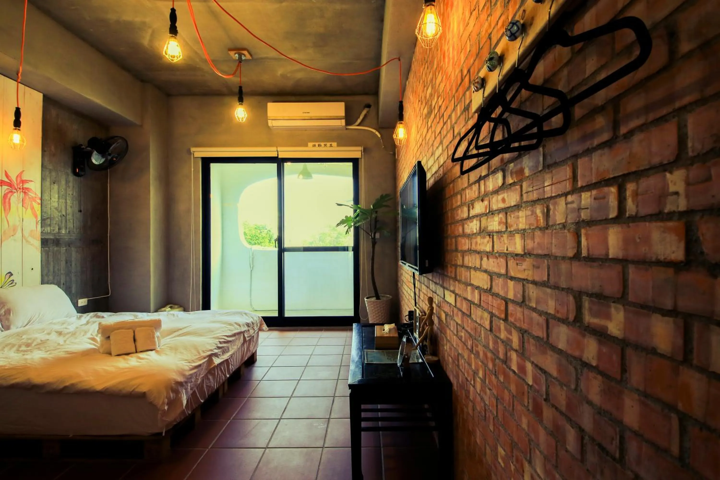 Photo of the whole room, Bed in Anping Wikid Design Hotel