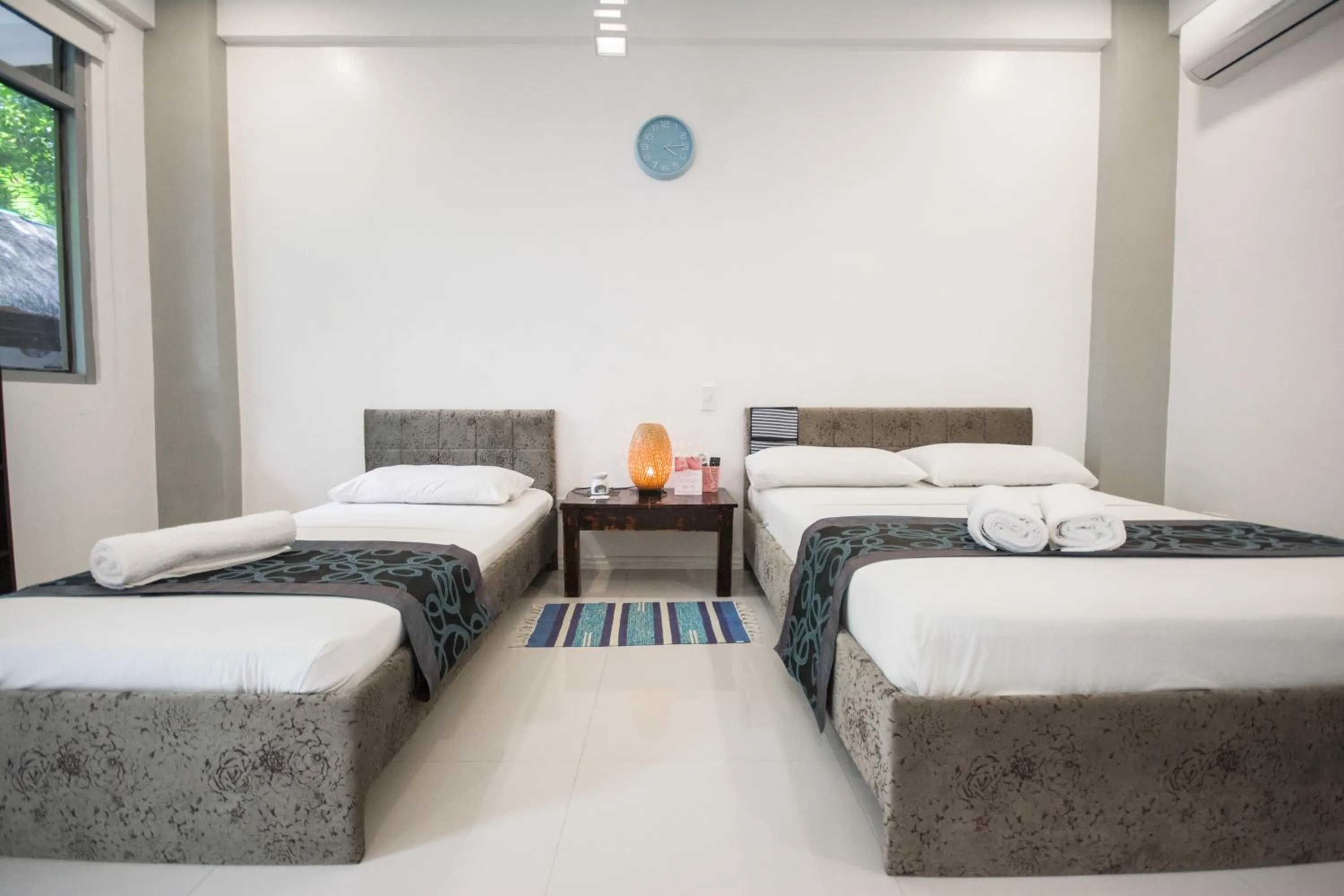 Bed in Everrich Boutique Resort Boracay