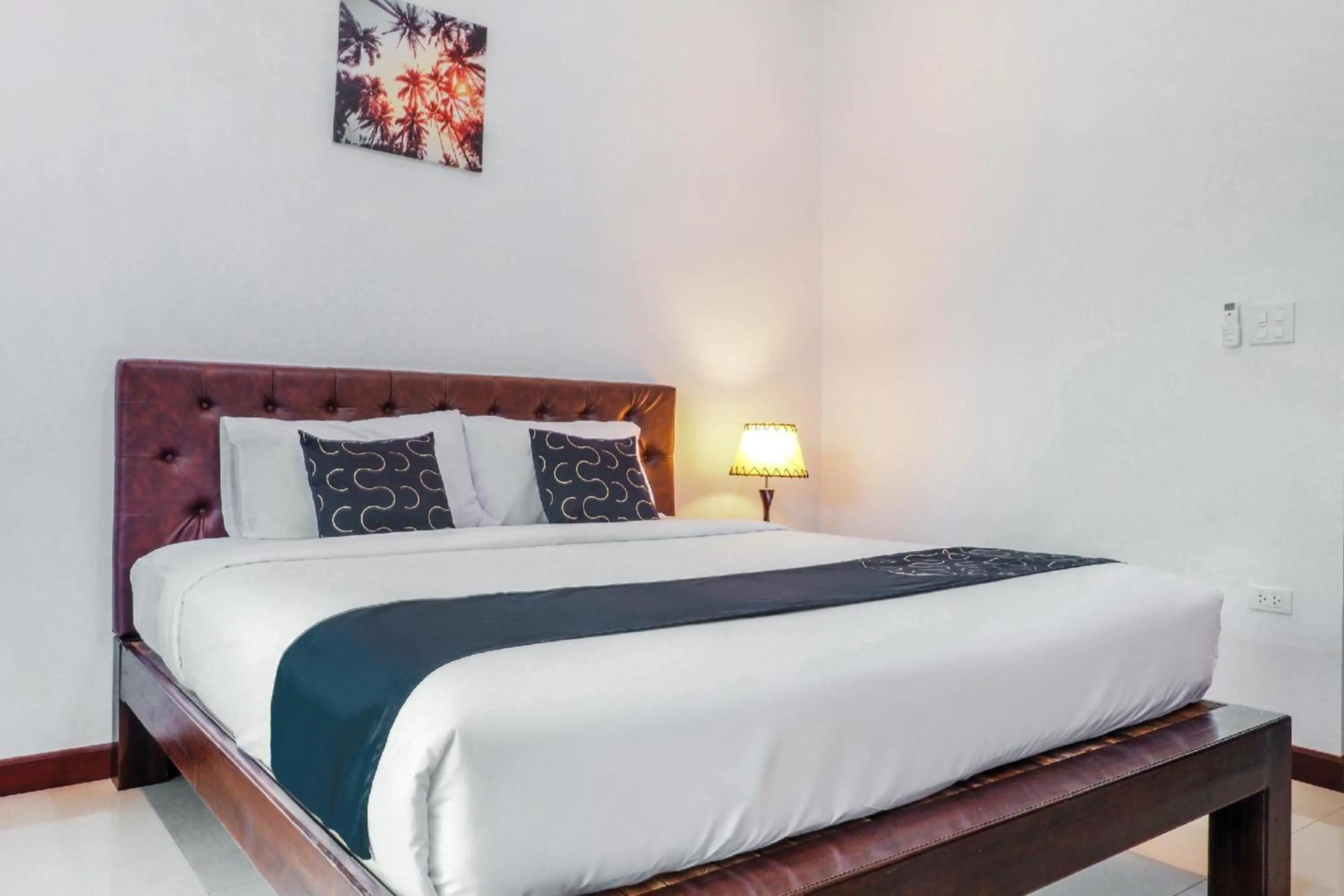 Photo of the whole room in Capital O 727 Be One Resort