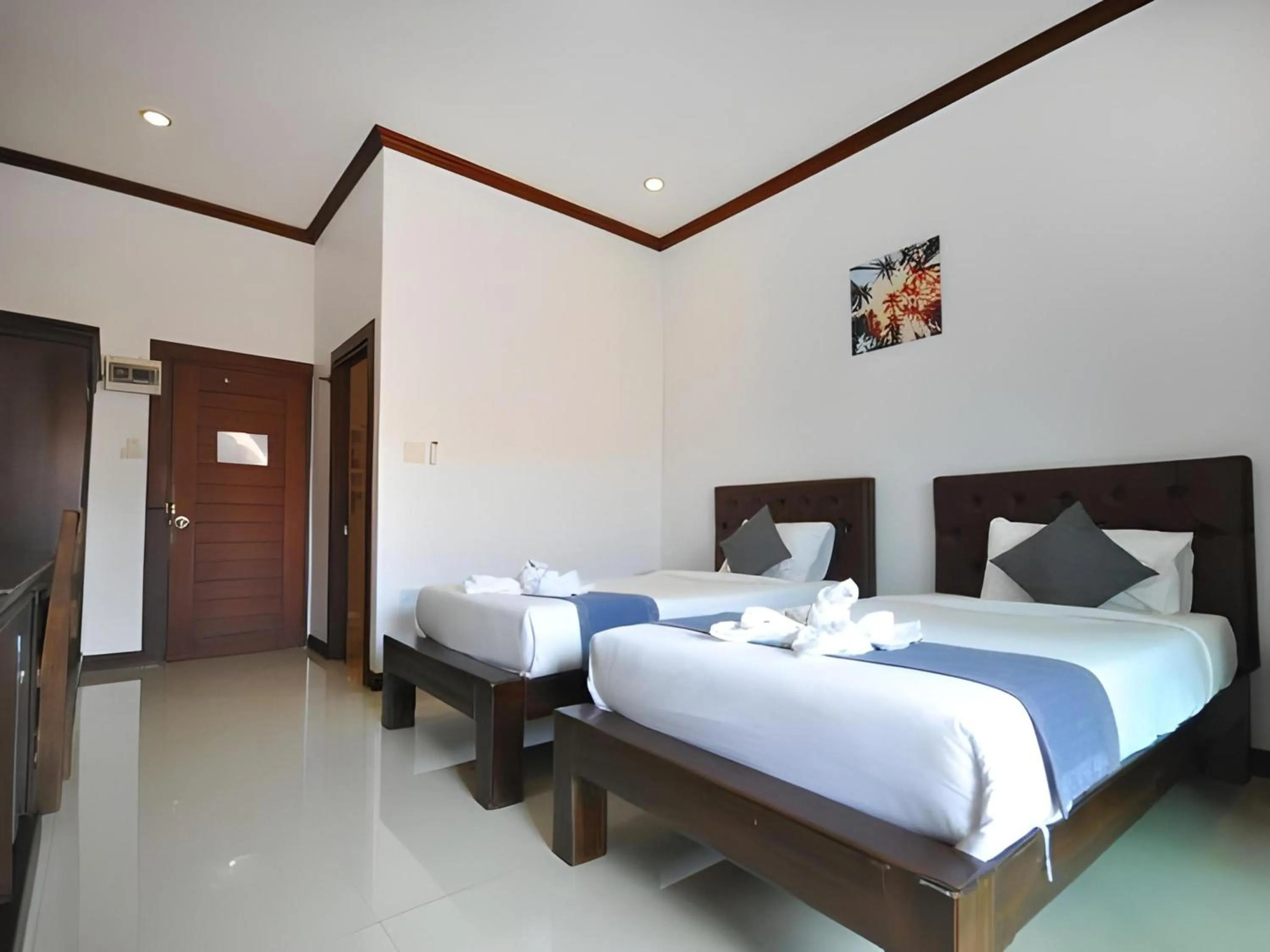 Photo of the whole room in Capital O 727 Be One Resort