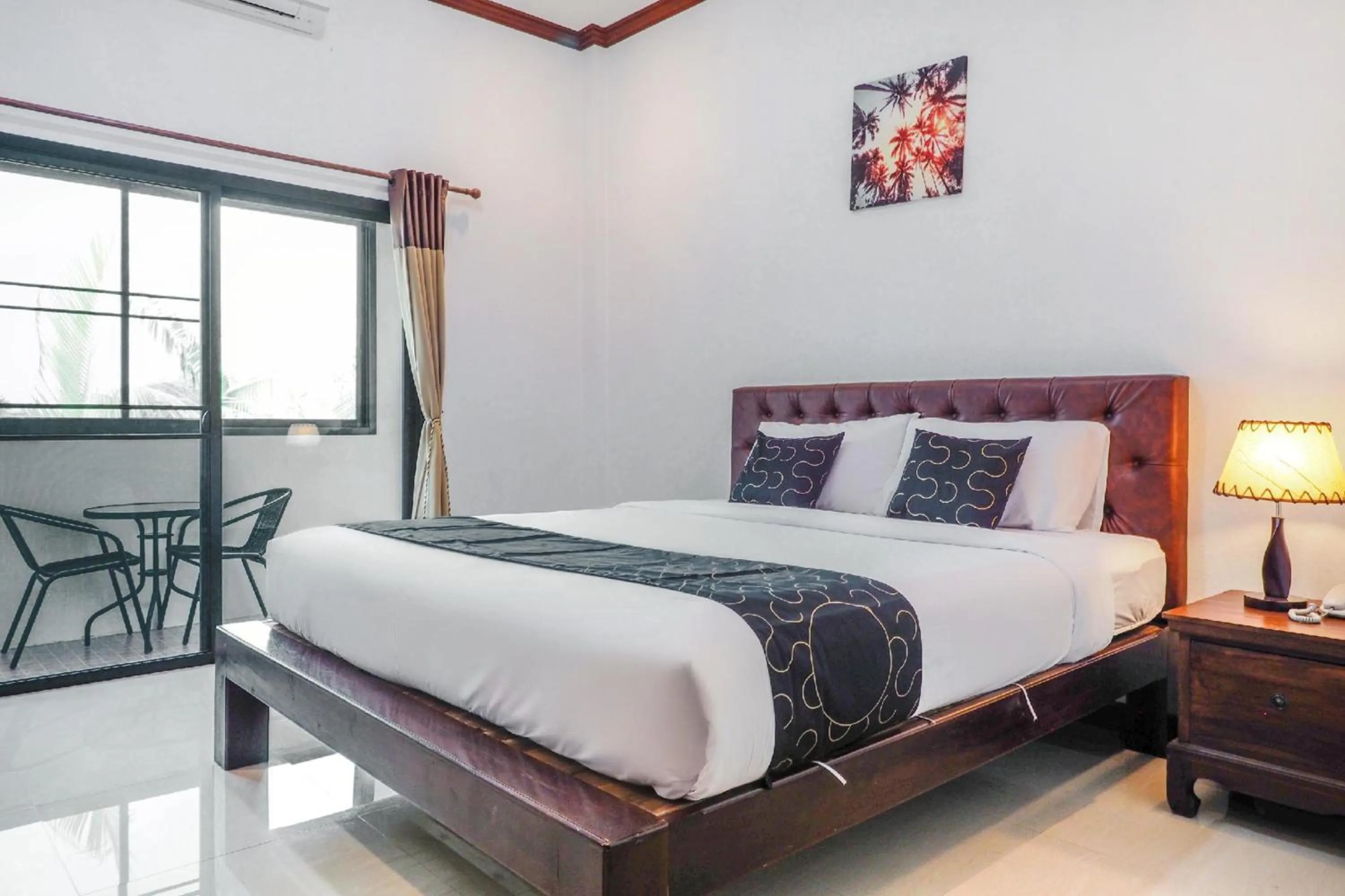 Photo of the whole room in Capital O 727 Be One Resort