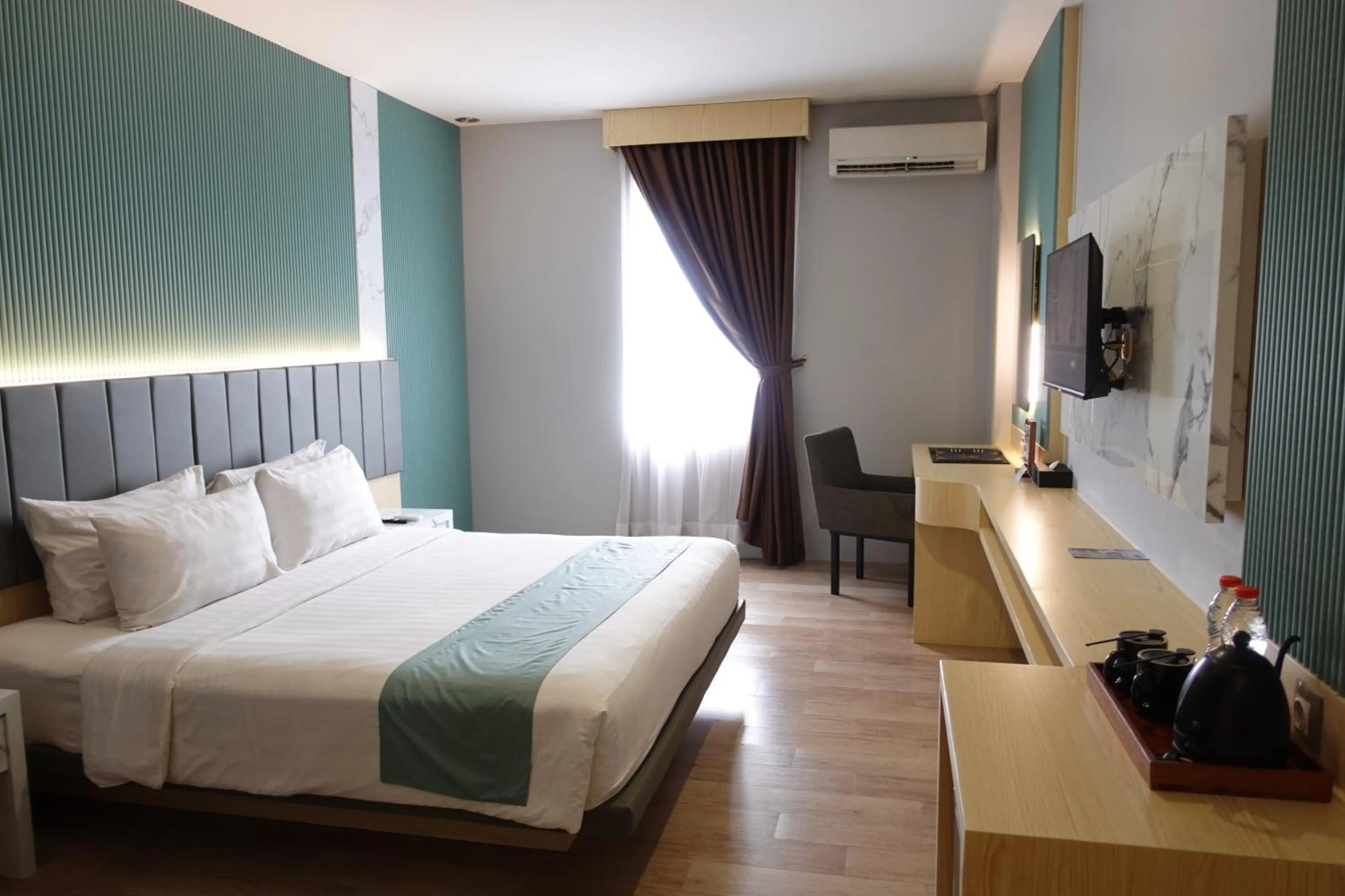 Bedroom, Bed in Grand Kangen Hotel Urip Sumoharjo