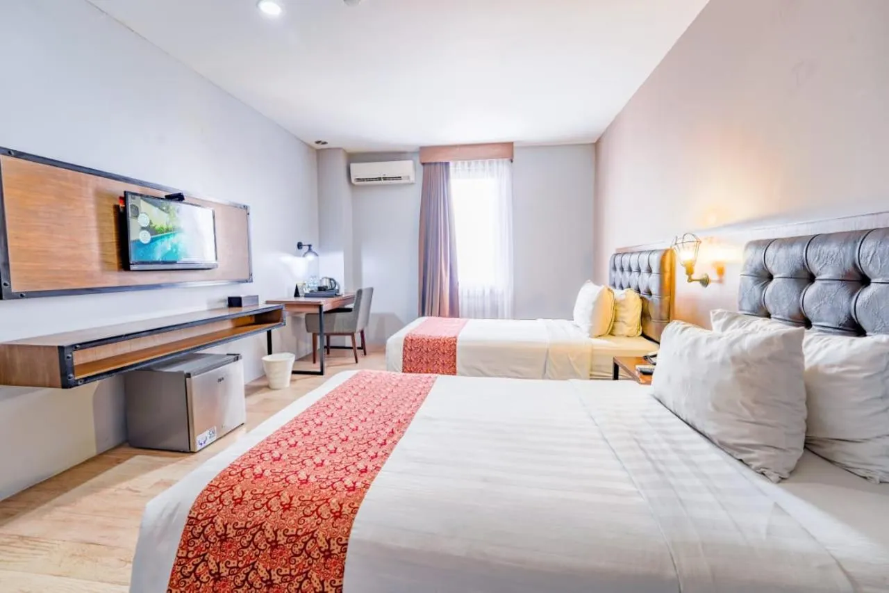 Bedroom, Bed in Grand Kangen Hotel Urip Sumoharjo