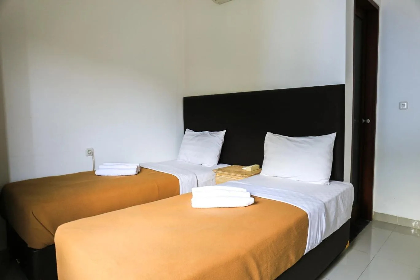 Family Suite with Balcony in Dewi Villa Padangbai Hotel