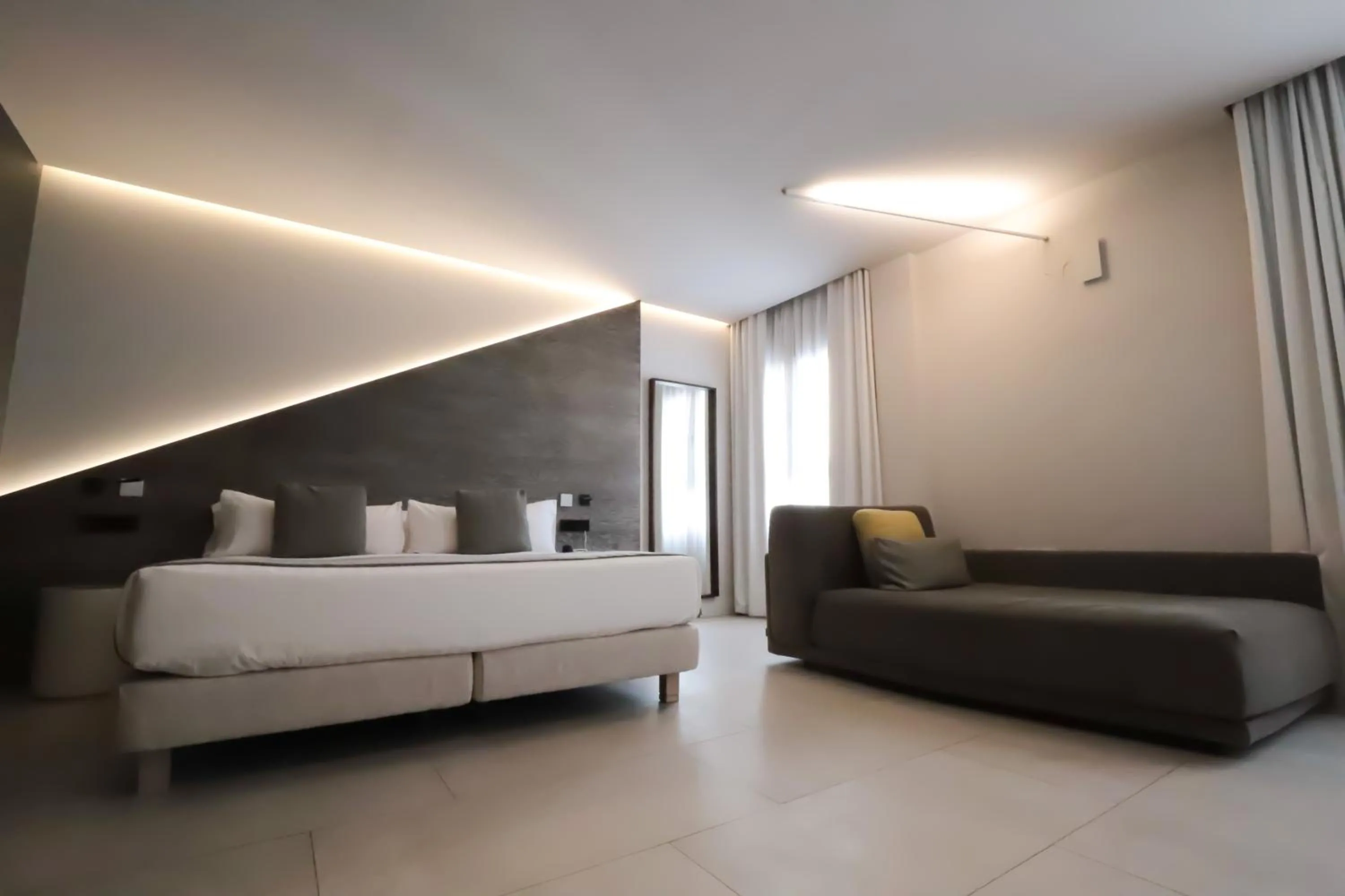 Bed in MYR Plaza Mercado & Spa