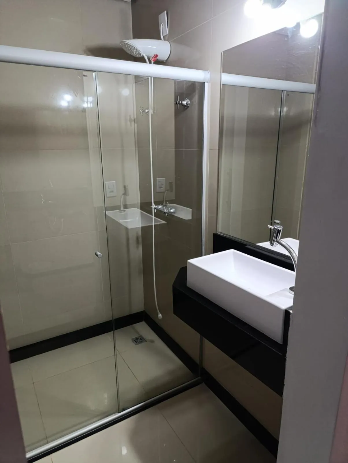 Shower in Aurora Hotel