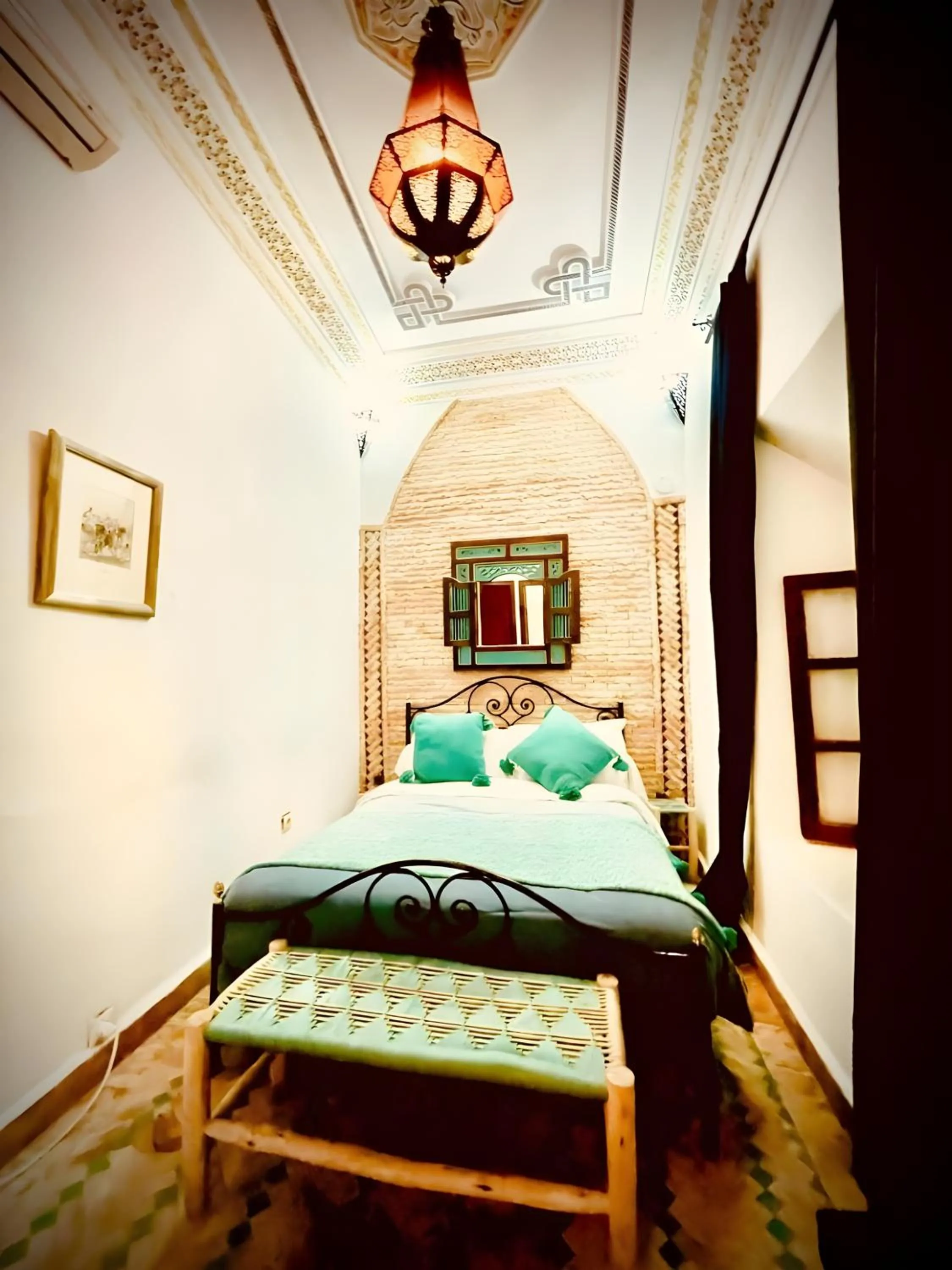 Bed in Riad le dromadaire bleu by Weekome
