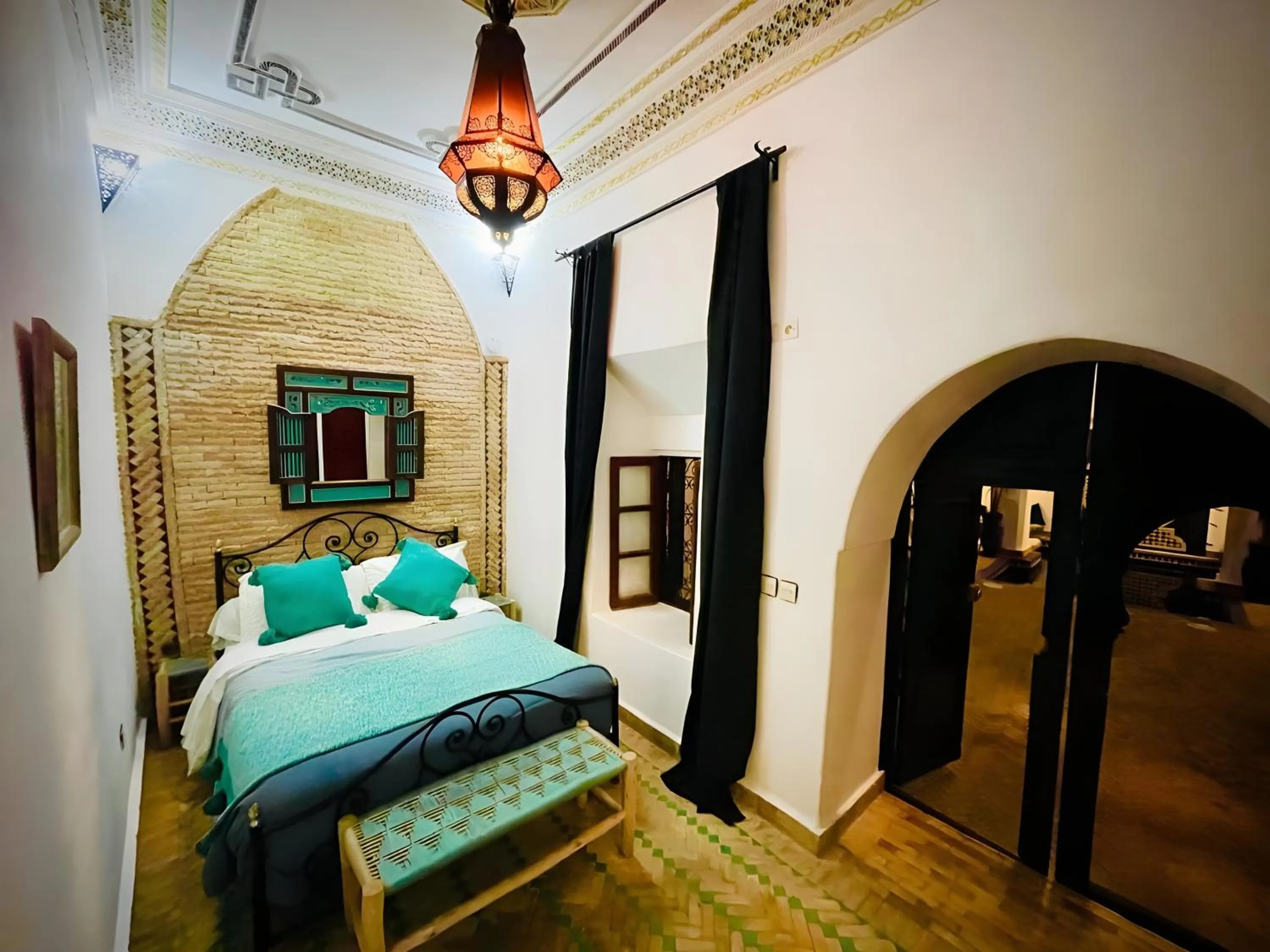 Bed in Riad le dromadaire bleu by Weekome