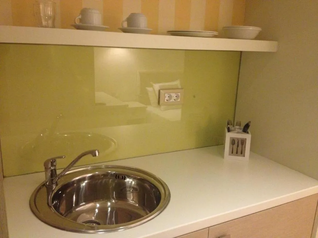 Kitchen or kitchenette in Iperion Beach Hotel